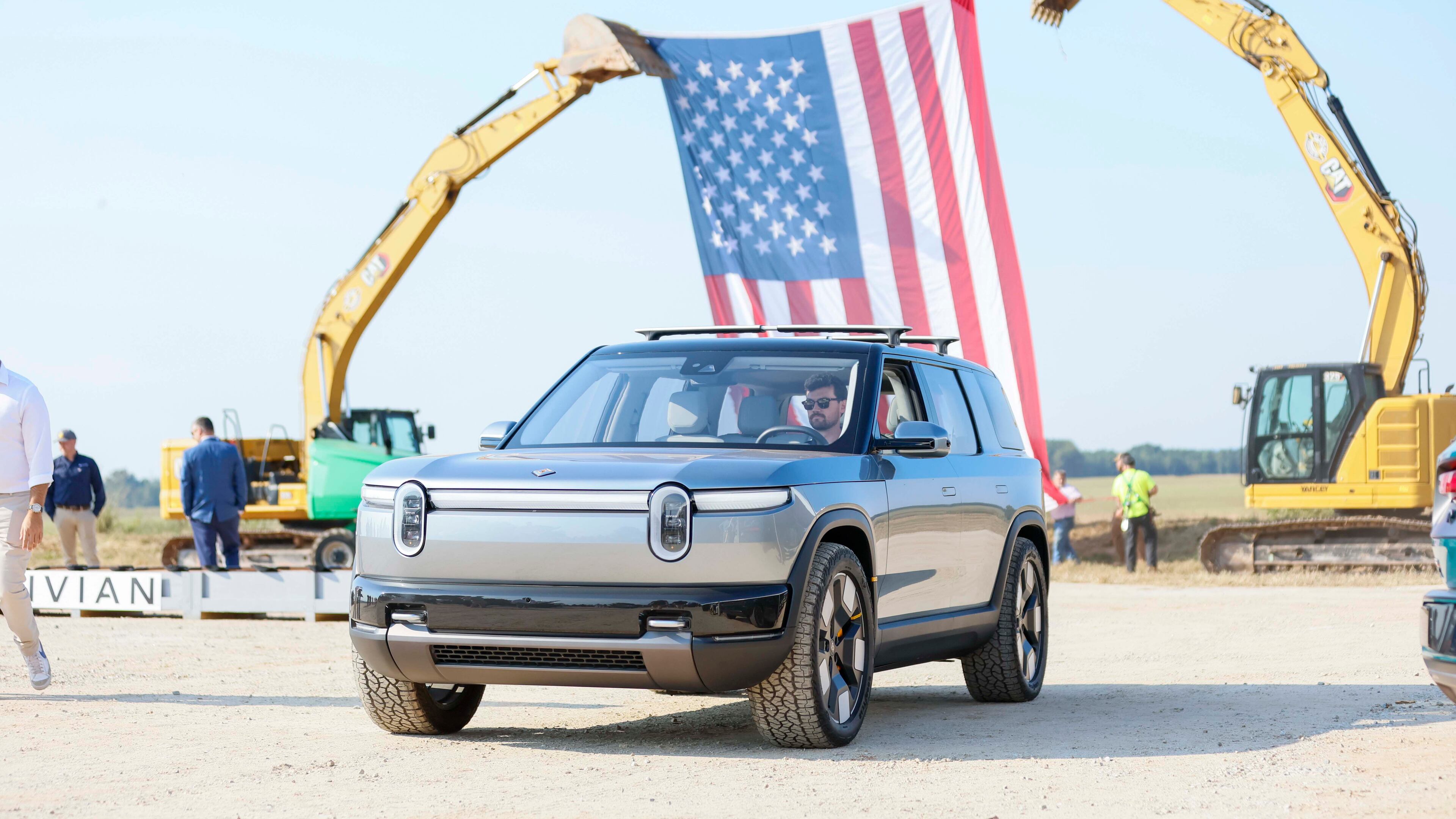 Rivian plans to cut about 4.5% of its workforce, resulting in changes to the company's vehicle servicing, delivery and marketing departments. (Miguel Martinez/AJC)