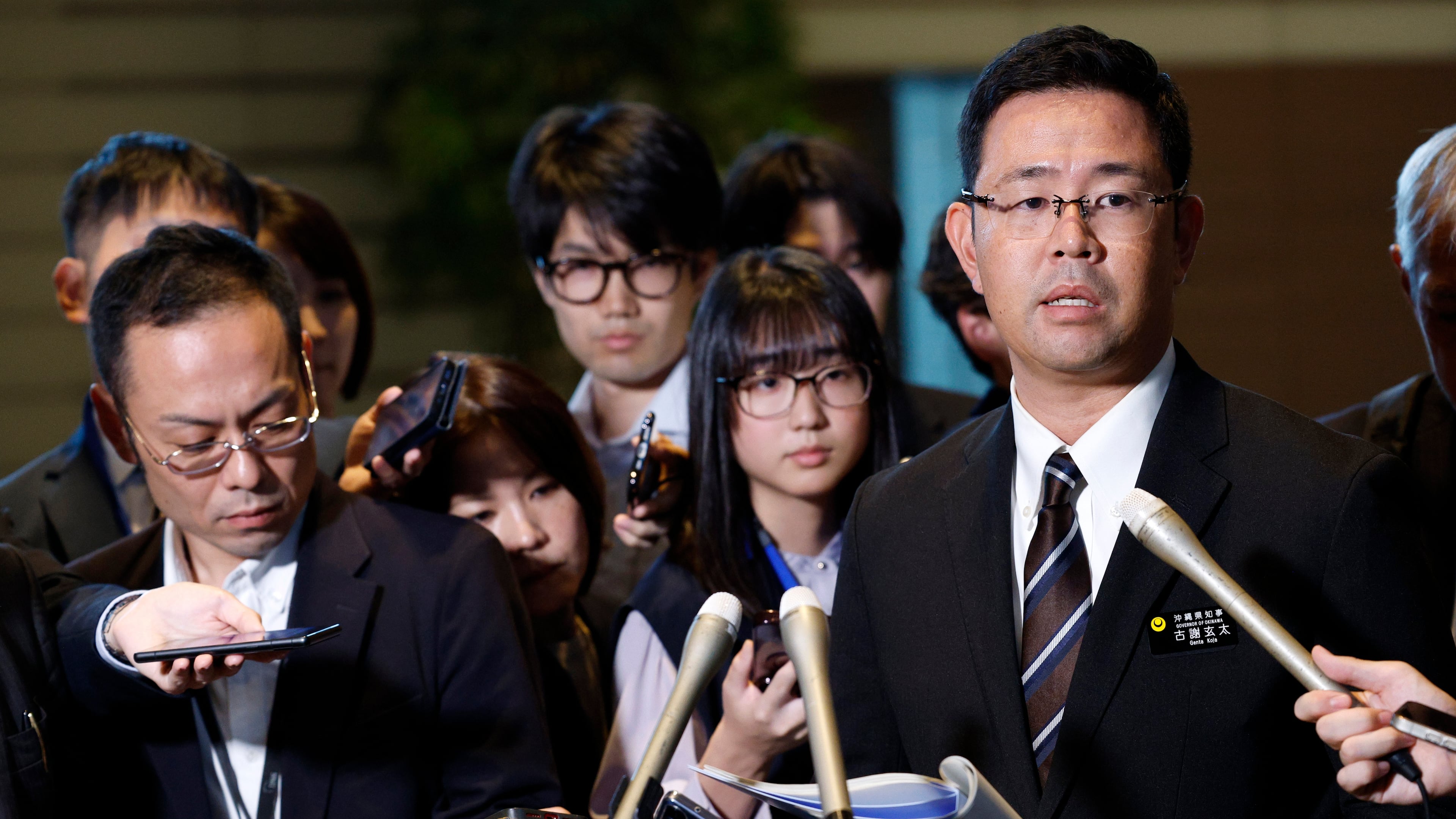 Okinawa Governor Genta Koja speaks to reporters after his meeting with Japanese Prime Minister Sanae Takaichi at the prime minister's office in Tokyo, Japan, Wednesday, Oct.7, 2026. (Franck Robichon/Pool Photo via AP)