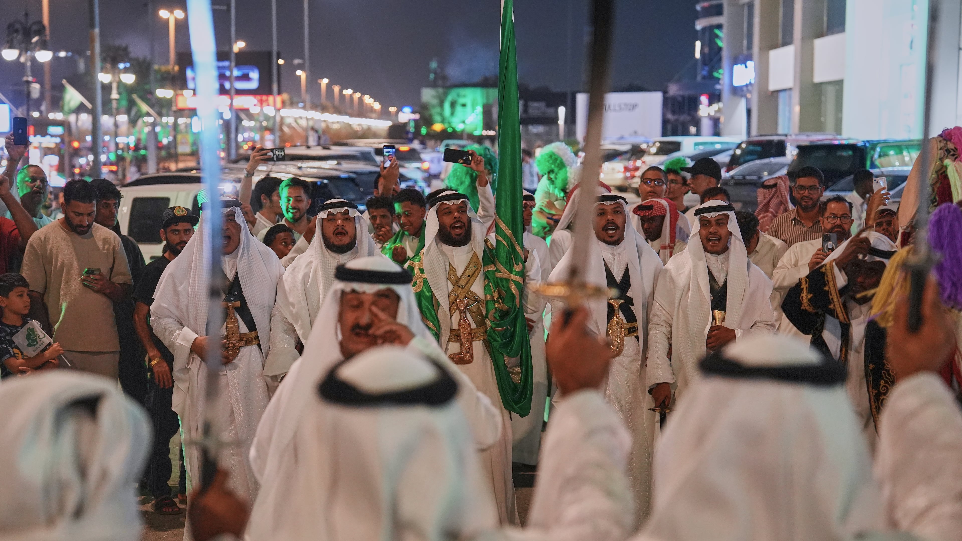 Men perform the traditional Saudi sword dance known as the ardah during celebrations marking Saudi Arabia's 96th National Day in Riyadh, Saudi Arabia, Wednesday, Sept. 23, 2026. (AP Photo/Baraa Anwer)