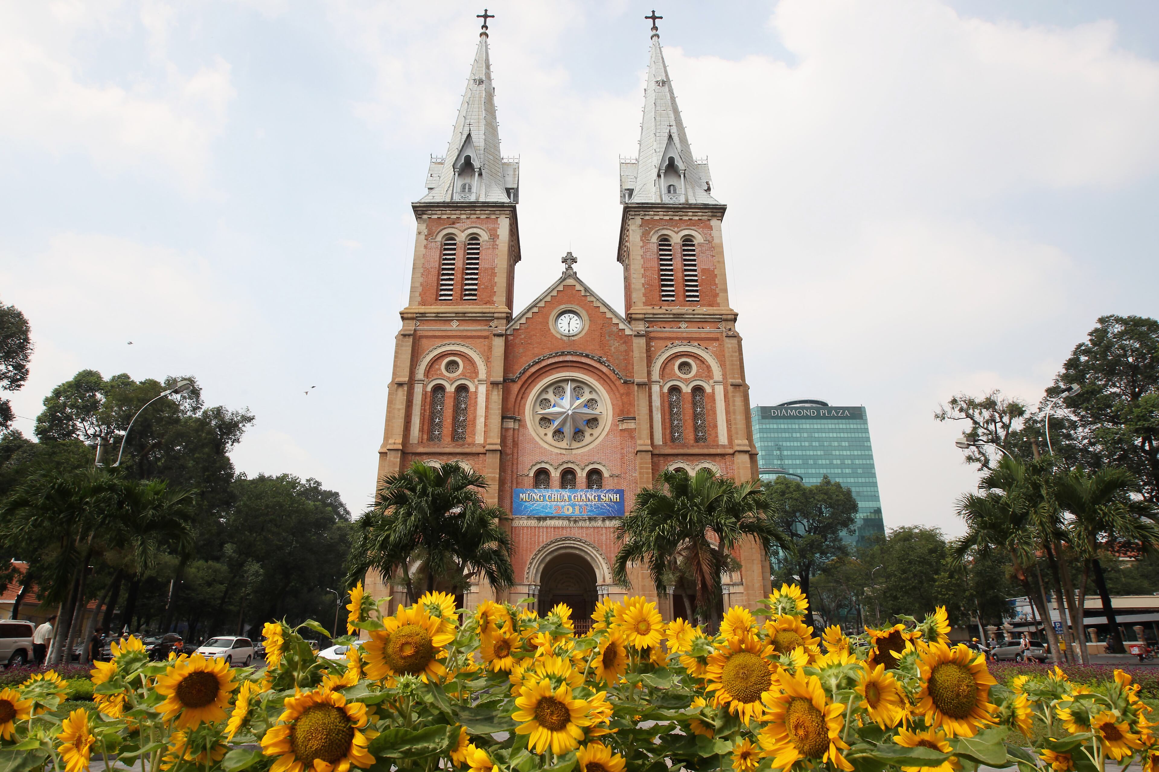 Sunflowers grow in front of Notre Dame Cathederalin Ho Chi Minh City, Vietnam. Chris Jackson/Getty Images