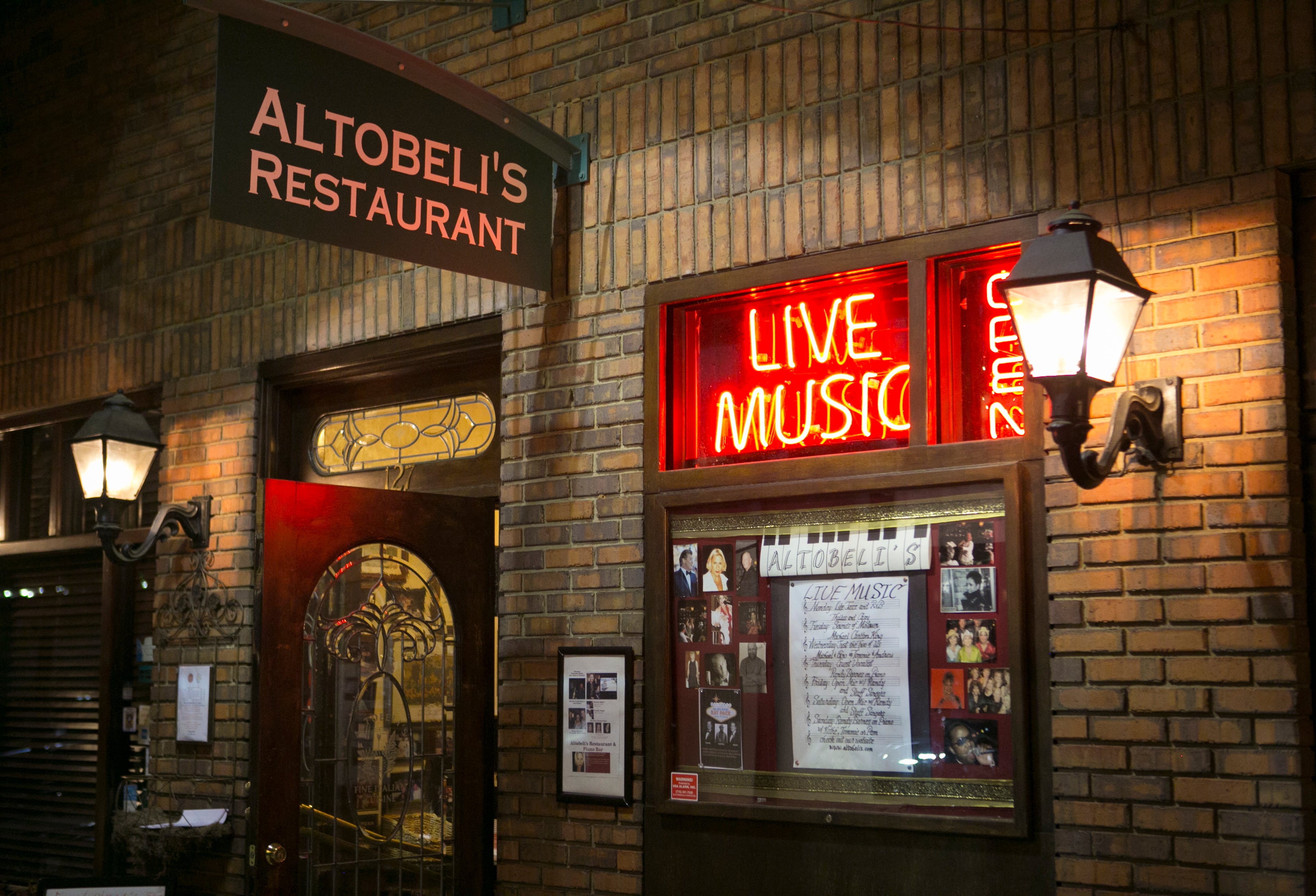 April 7, 2016 - Johns Creek, Ga: The front entrance is shown at Altobeli's Restaurant and Piano Bar Thursday, April 7, 2016, in Johns Creek, Ga. Altobeli's Restaurant and Piano Bar is an Italian neighborhood restaurant that's served the community for over 25 years. This is for the insider's guide feature about the Newtown neighborhood. PHOTO / JASON GETZ