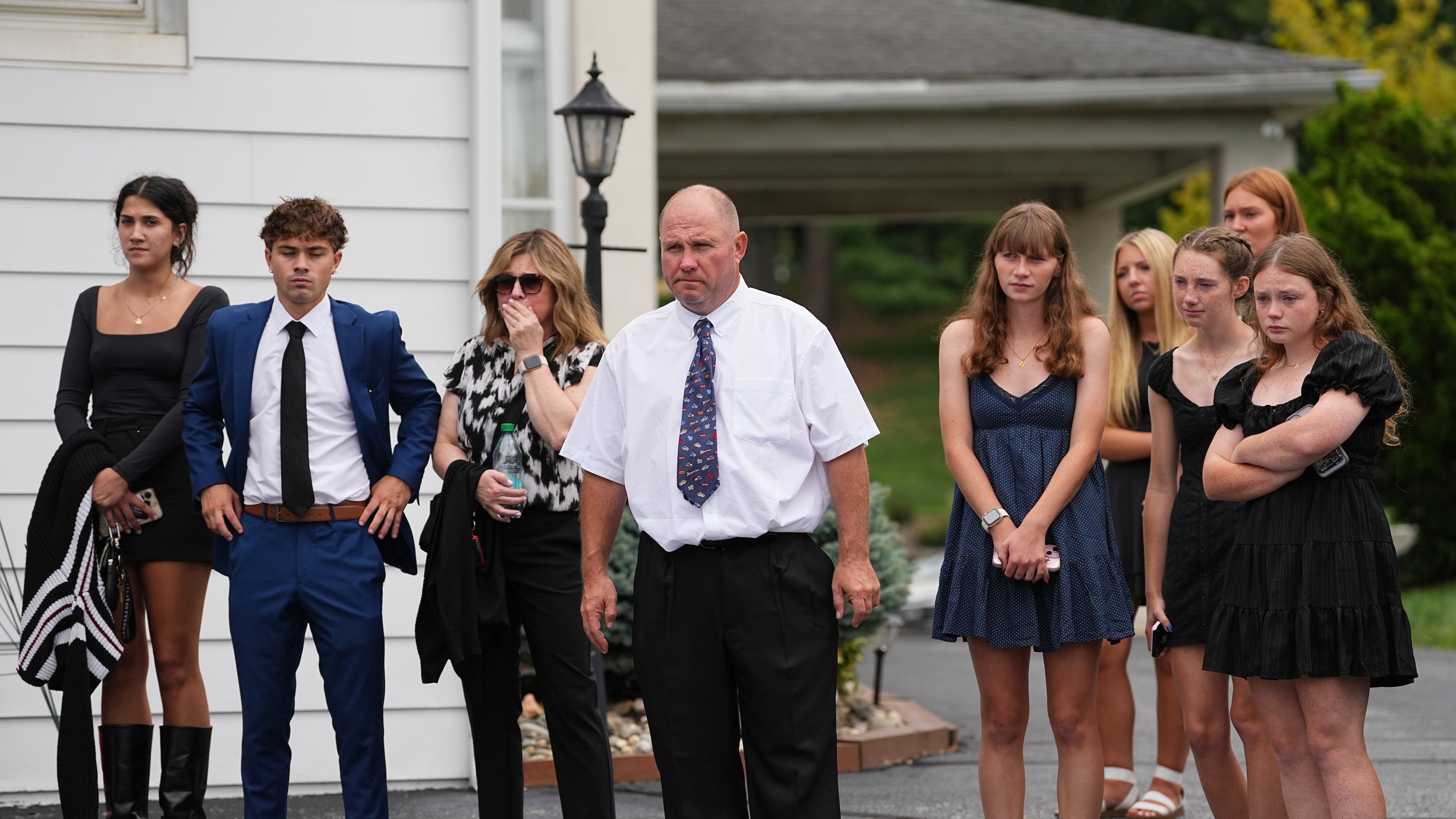 Glenwood Pysher III, watches as pallbearers carry a casket containing the remains of his son Glenwood "Bubba" Pysher IV who was killed by police, in Pottstown, Pa., Monday, Aug. 31, 2026. (AP Photo/Matt Rourke)