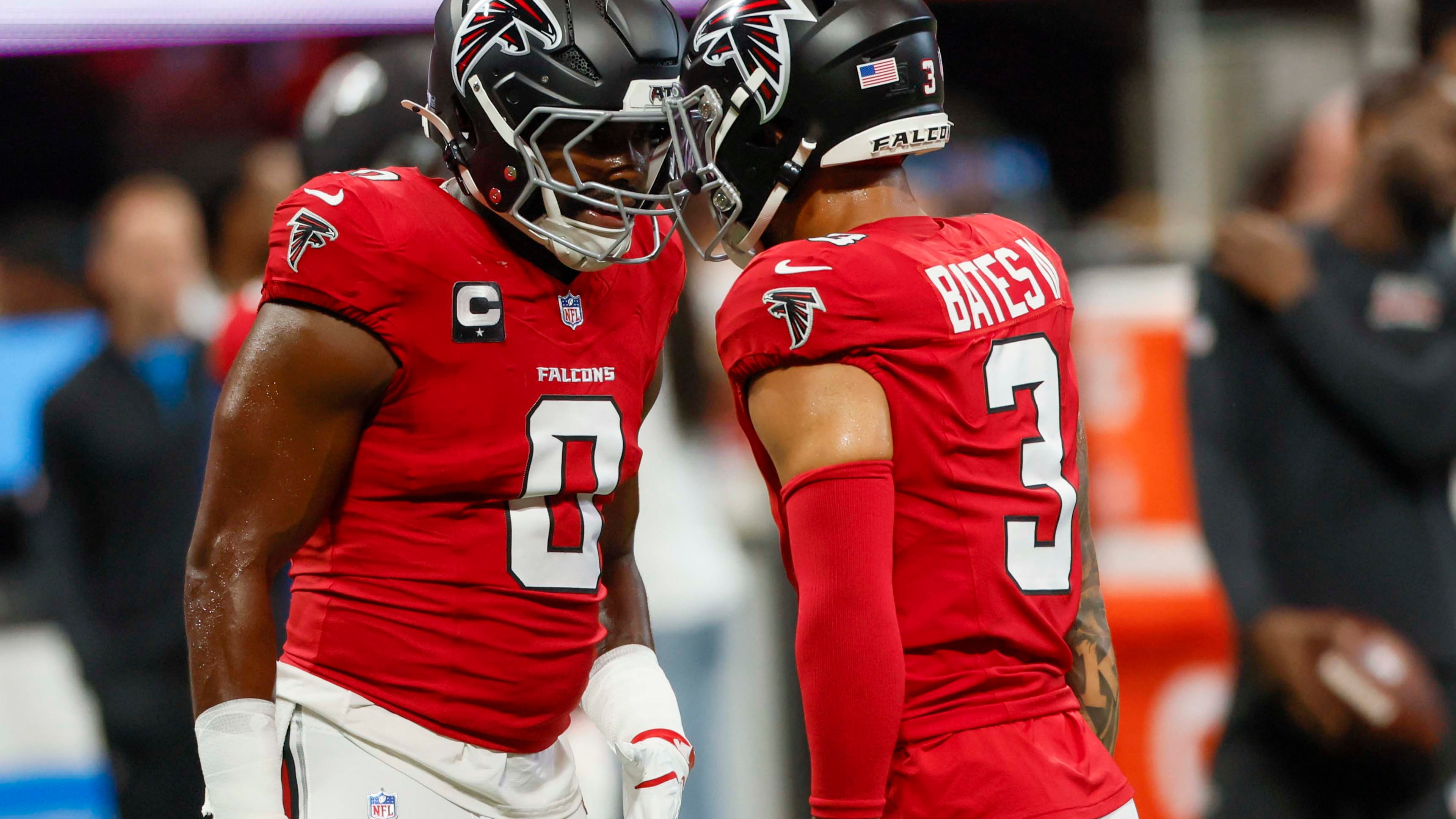 Atlanta Falcons linebacker Divine Deablo (0), left, and Atlanta Falcons safety Jessie Bates III (3) share a moment during warm-ups before the game against the Carolina Panthers at Mercedes-Benz Stadium in Atlanta on Sunday, Sept. 20, 2026. (Miguel Martinez/AJC)