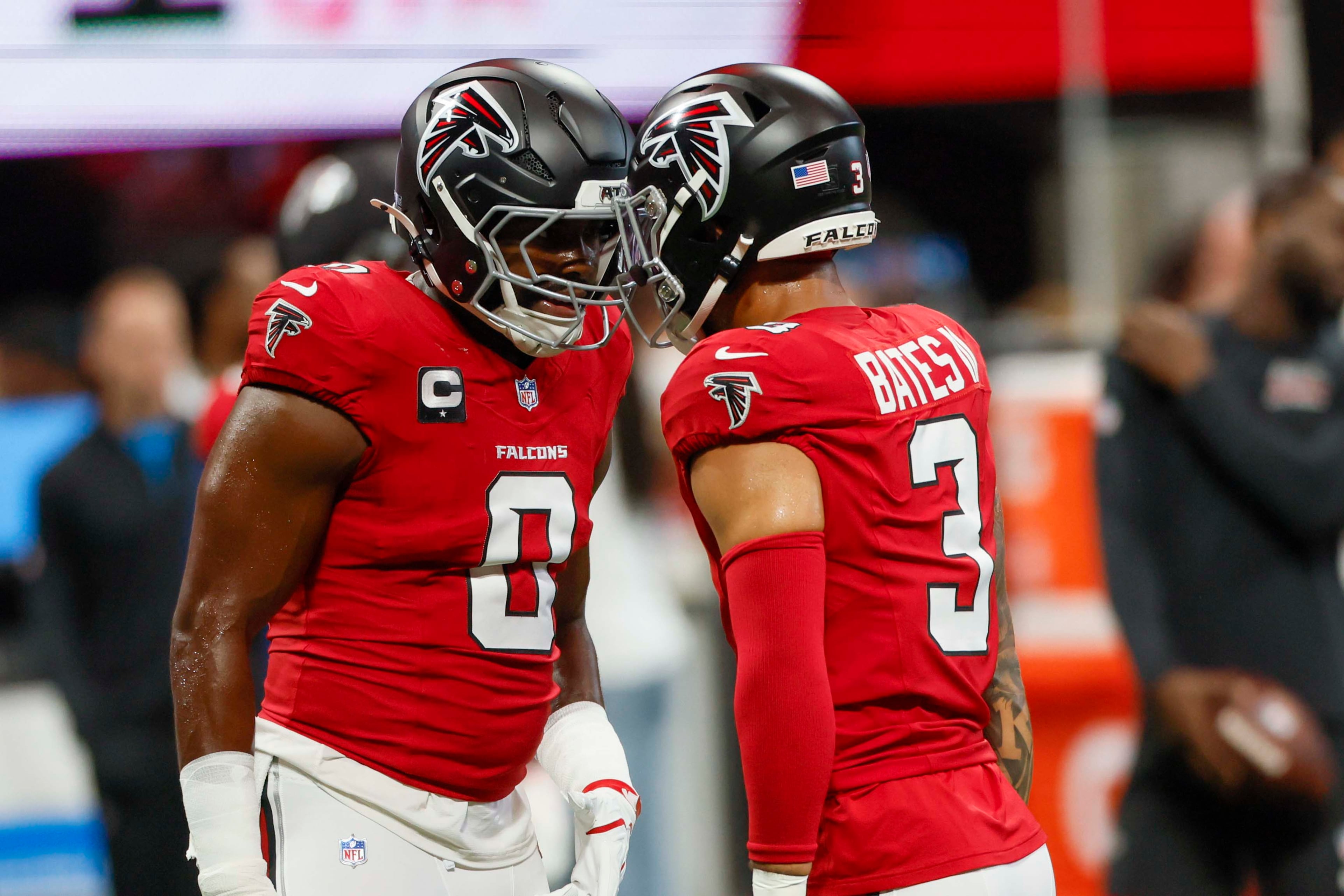 Atlanta Falcons linebacker Divine Deablo (0) left, and Atlanta Falcons safety Jessie Bates III (3) share a moment during warm-ups before the game against the Carolina Panthers at Mercedes-Benz Stadium in Atlanta on Sunday, September 20, 2026. (Miguel Martinez/AJC)