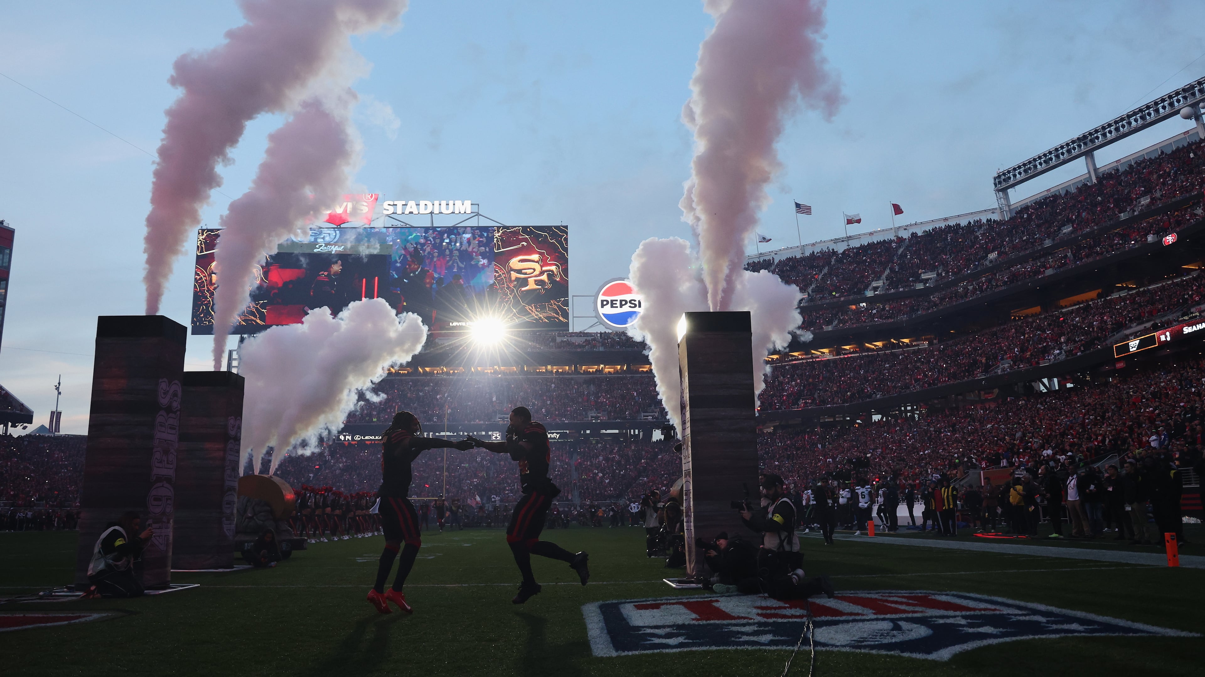 San Francisco 49ers wide receivers Demarcus Robinson, left, and Kendrick Bourne take the field before an NFL football game against the Seattle Seahawks in Santa Clara, Calif., Saturday, Jan. 3, 2026. (AP Photo/Jed Jacobsohn)