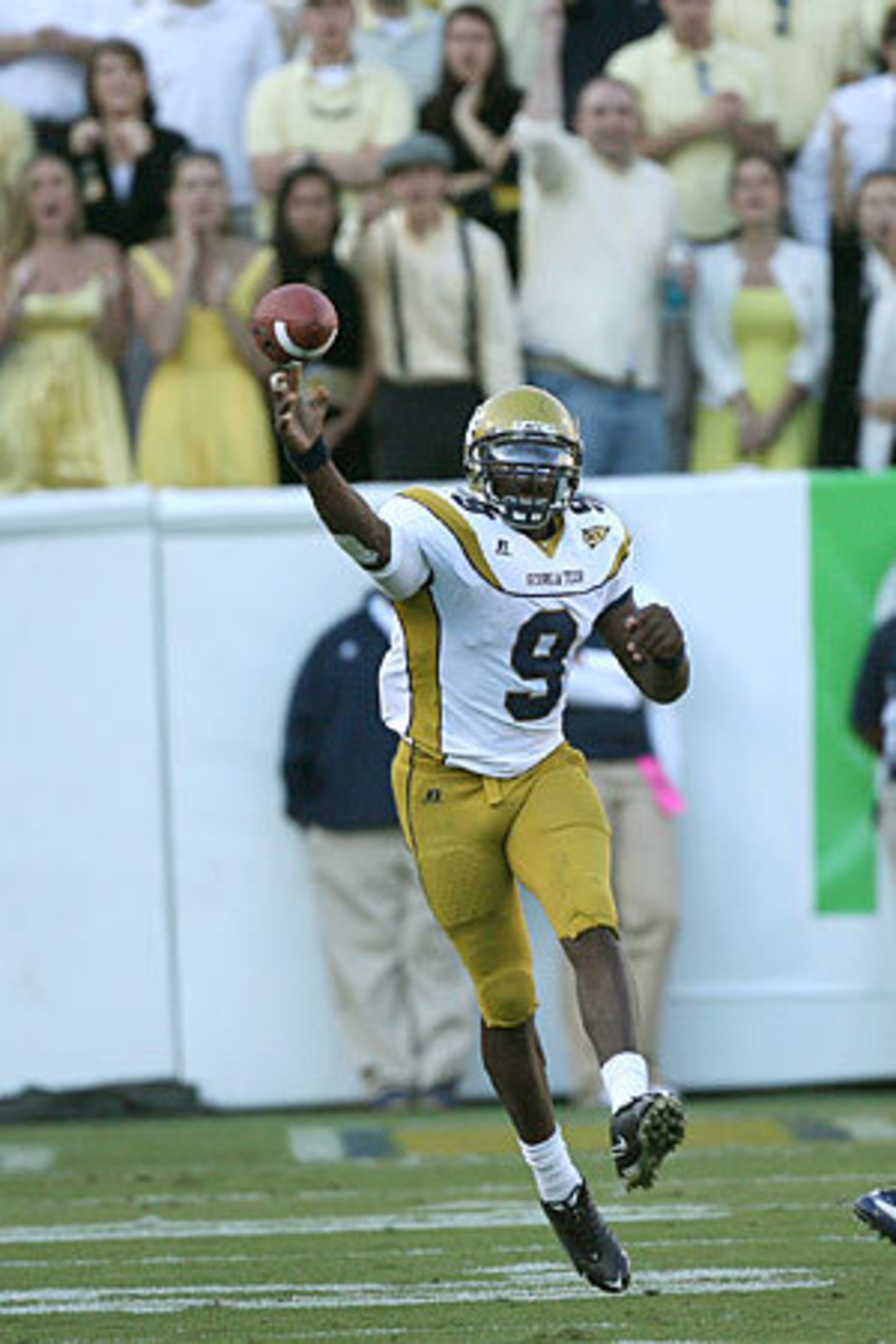 Georgia Tech's Josh Nesbitt throws a first down pass to Demaryius Thomas on Tech's final drive in the fourth quarter .