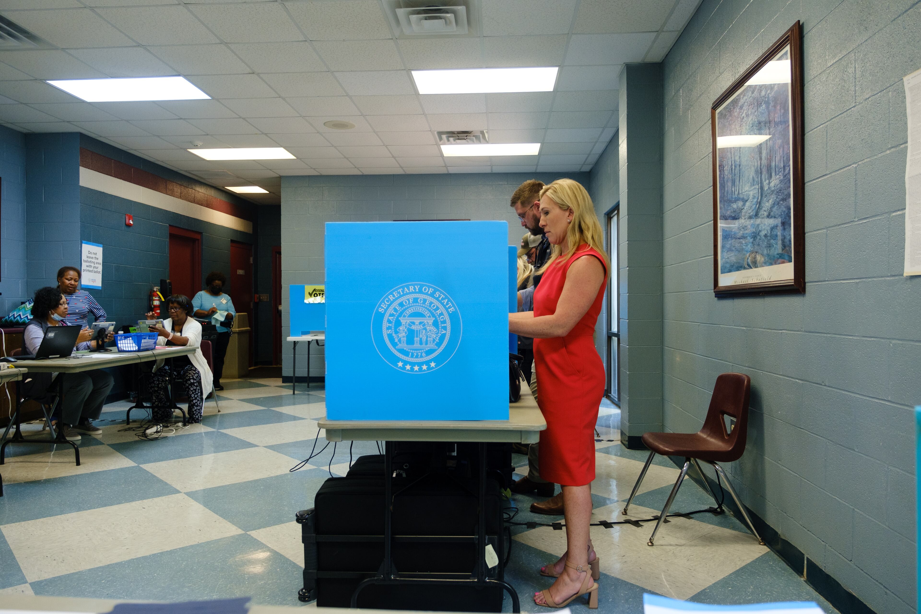 U.S. Rep. Marjorie Taylor Greene casts an early vote in Rome on Monday, May 2, 2022. (Arvin Temkar / arvin.temkar@ajc.com)