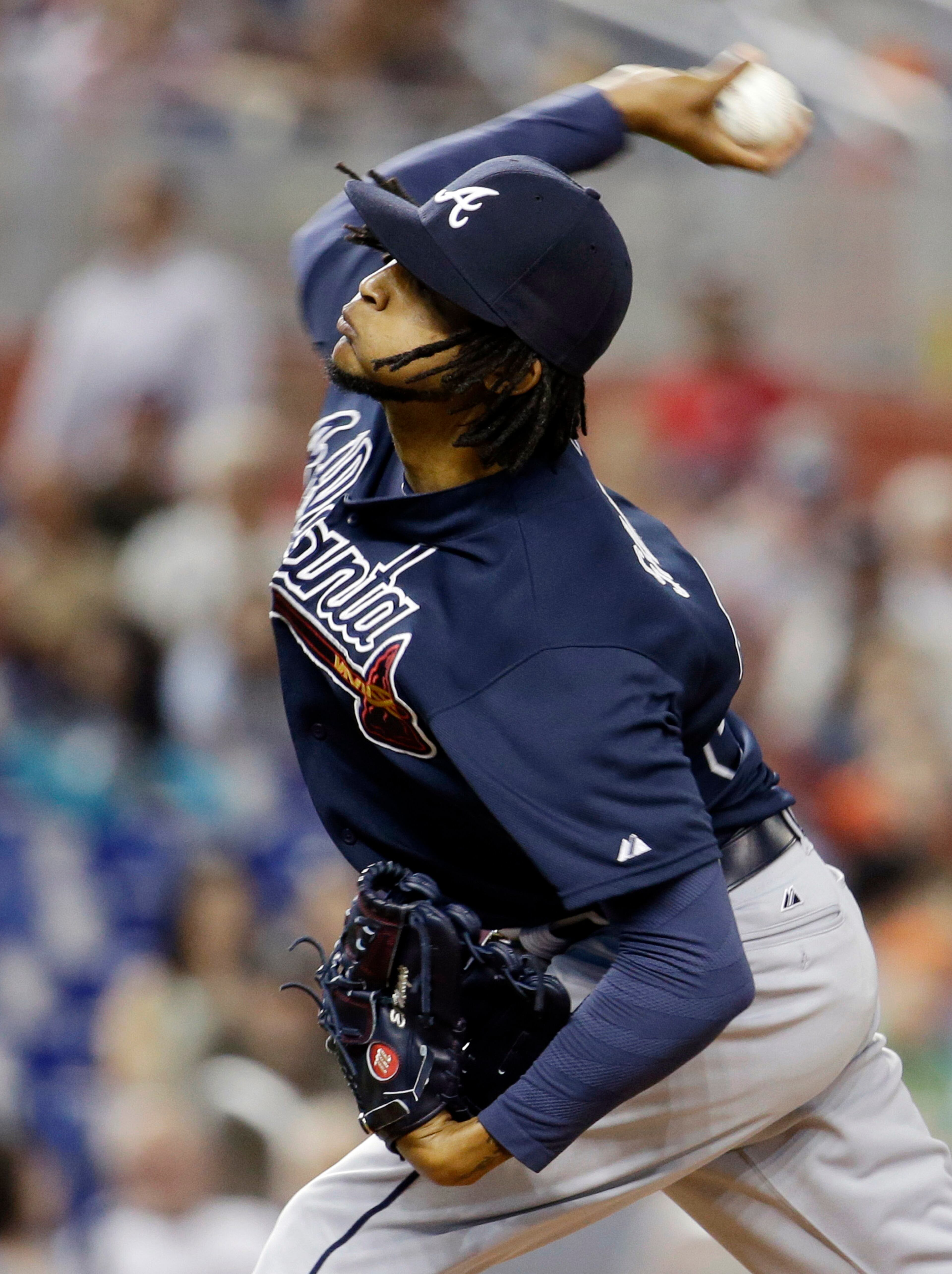 Atlanta Braves starting pitcher Ervin Santana throws in the first inning of a baseball game against the Miami Marlins, Thursday, May 1, 2014, in Miami. (AP Photo/Lynne Sladky)