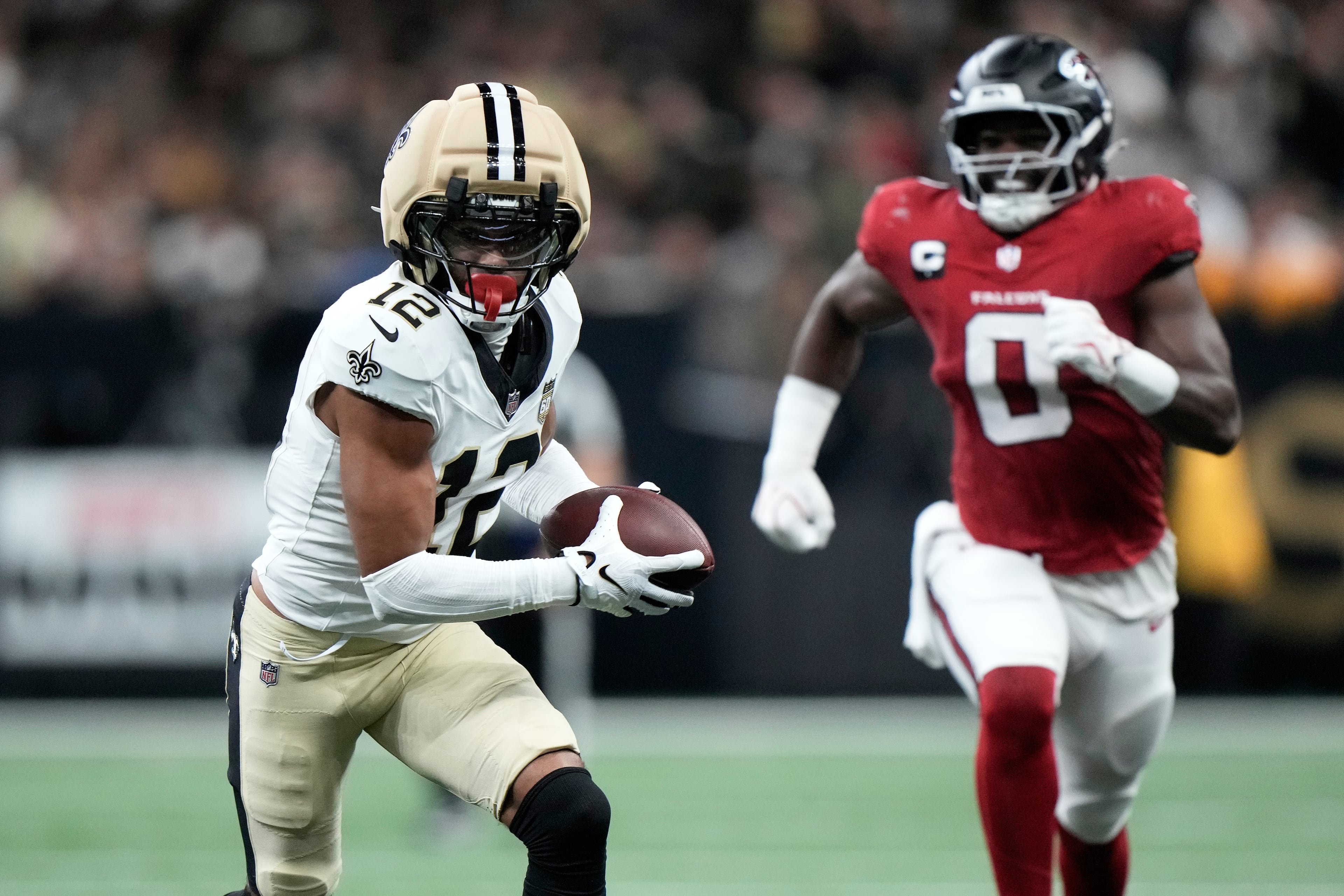New Orleans Saints wide receiver Chris Olave runs against Atlanta Falcons linebacker Divine Deablo during the first half of an NFL football game in New Orleans, Monday, Oct. 5, 2026. (Gerald Herbert/AP)