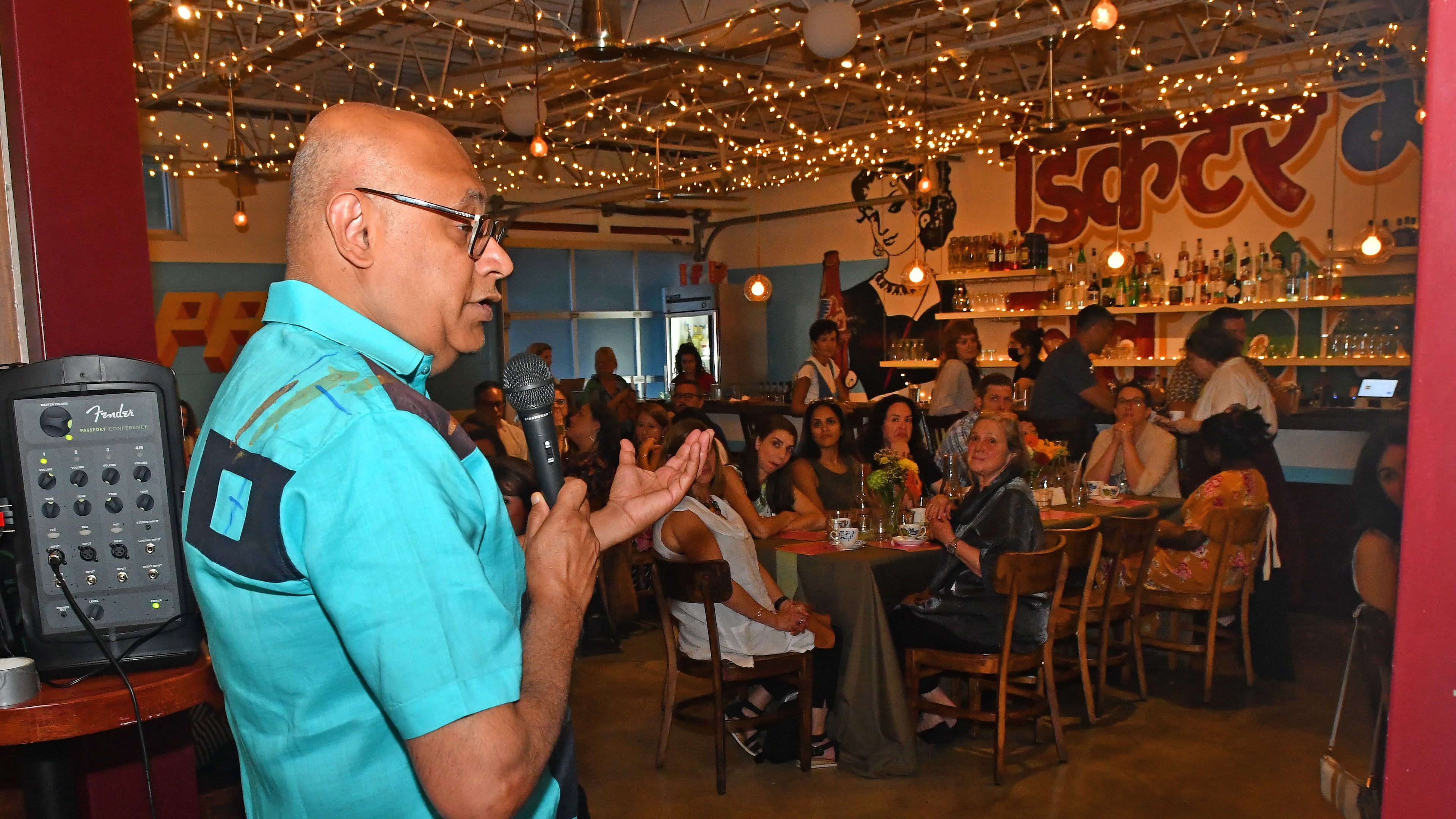 Chef and author Vishwesh Bhatt greets guests at the sold-out multicourse meal and event celebrating his newly released cookbook, ”I Am From Here: Stories and Recipes From a Southern Chef” (Norton, $37.50), on Aug. 9, 2022, at Chai Pani in downtown Decatur. (Chris Hunt for the AJC)