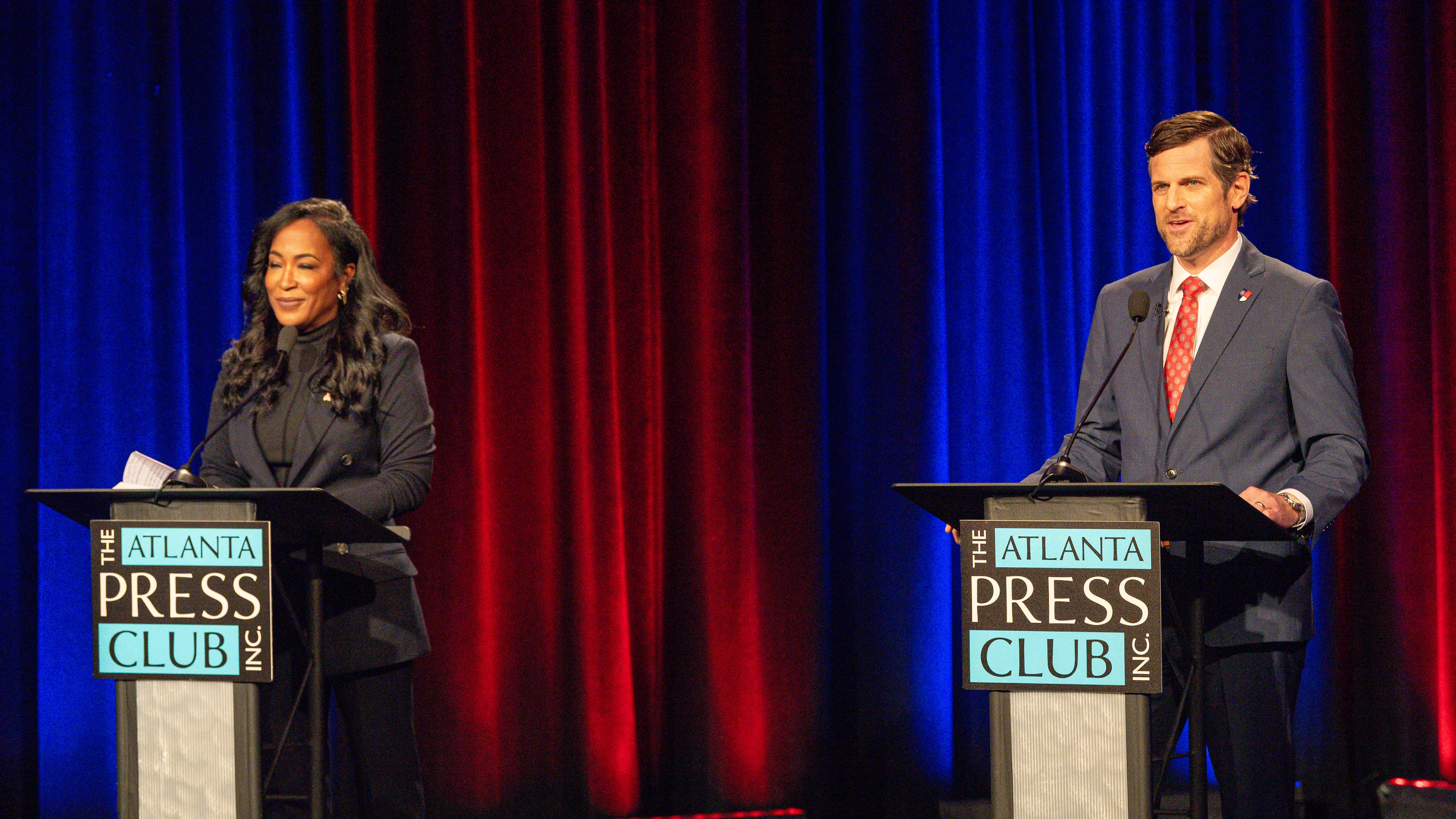 Democrat Tanya Miller, left, and Republican Brian Strickland, seen here at the attorney general debate last week hosted by the Atlanta Press Club. (Pool photos by J Glenn Photography)