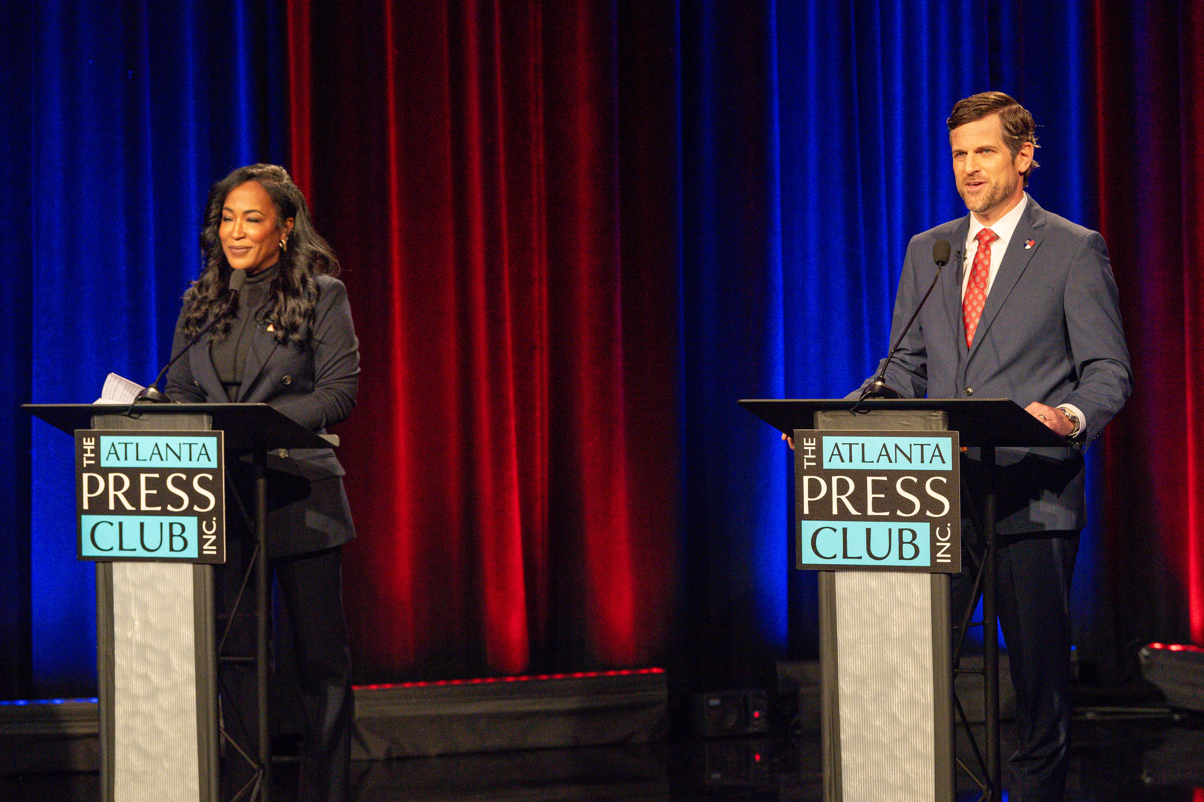 Democrat Tanya Miller, left, and Republican Brian Strickland, seen here at the attorney general debate last week hosted by the Atlanta Press Club. (Pool photos by J Glenn Photography)