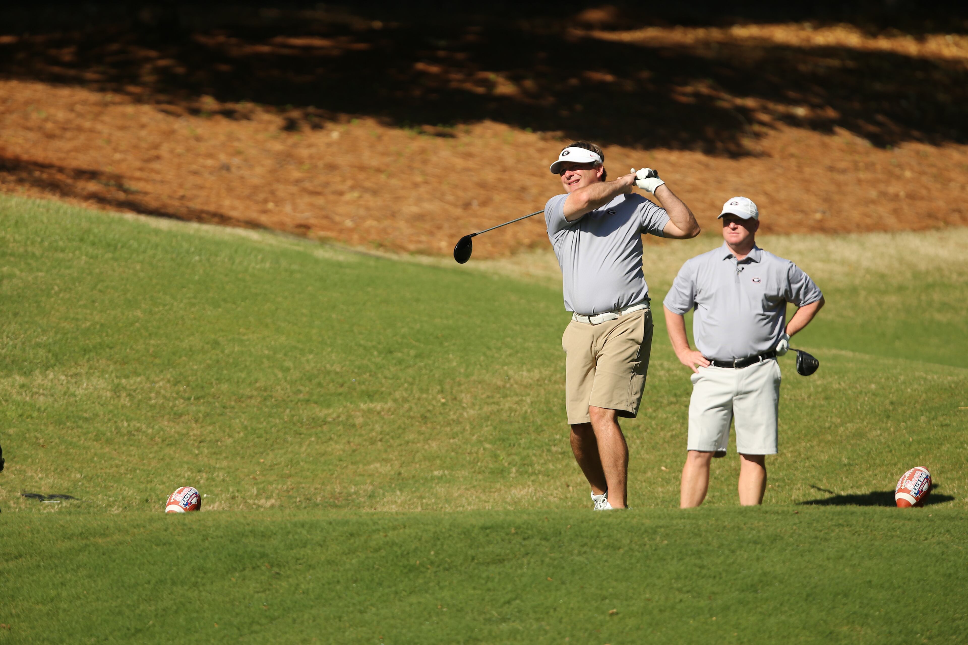 Georgia head football football coach Kirby Smart tees off during the Chick-fil-A Peach Bowl Challenge at the Ritz Carlton Reynolds, Lake Oconee, on Tuesday, April 30, 2019, in Greensboro, GA. (Chris Collins via Abell Images for Chick-fil-A Peach Bowl Challenge)