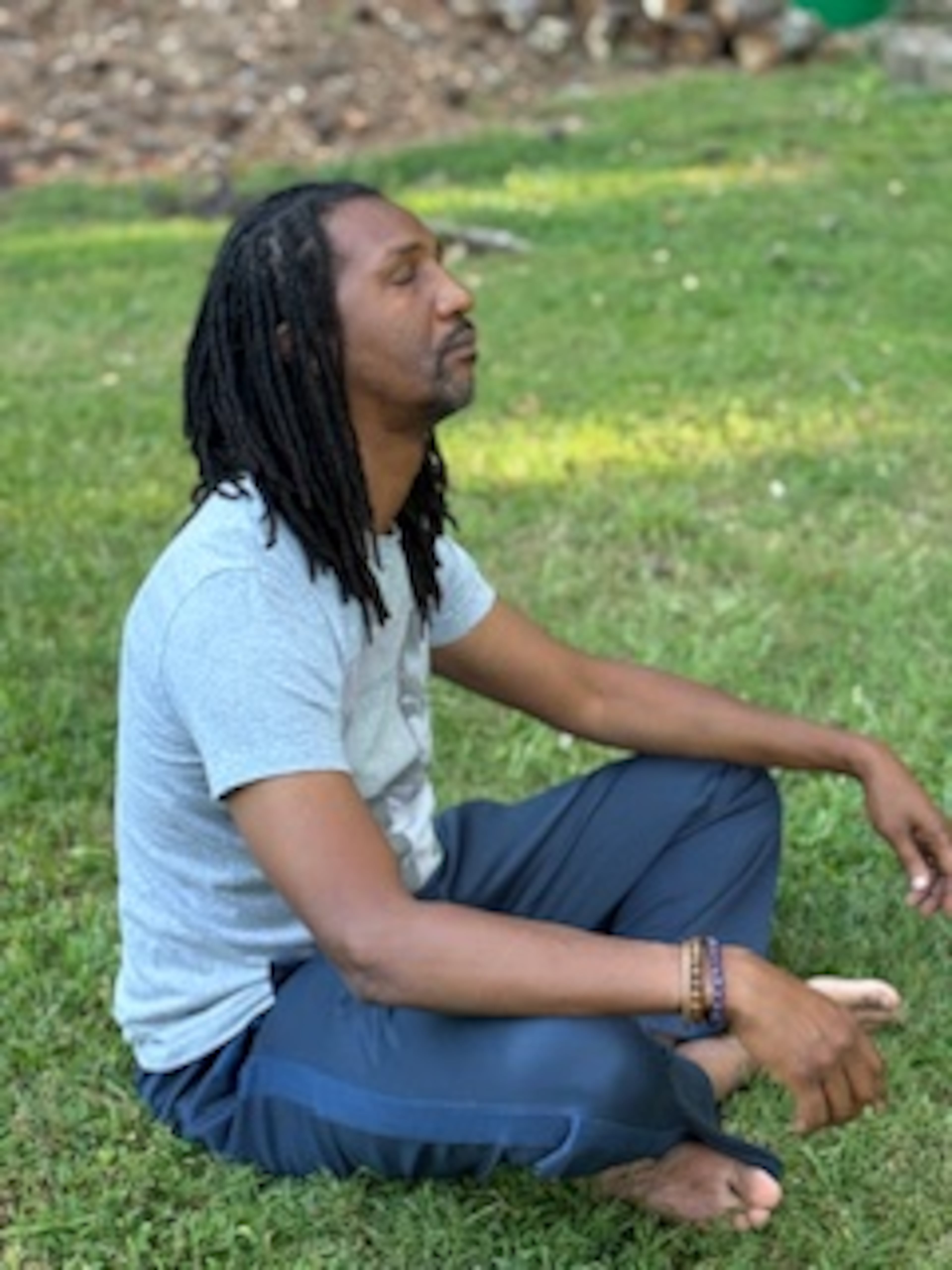 Elrico “Rick” Saddler practices grounding, a technique he learned about during his exploration of meditation. (Courtesy of Karteua Saddler)