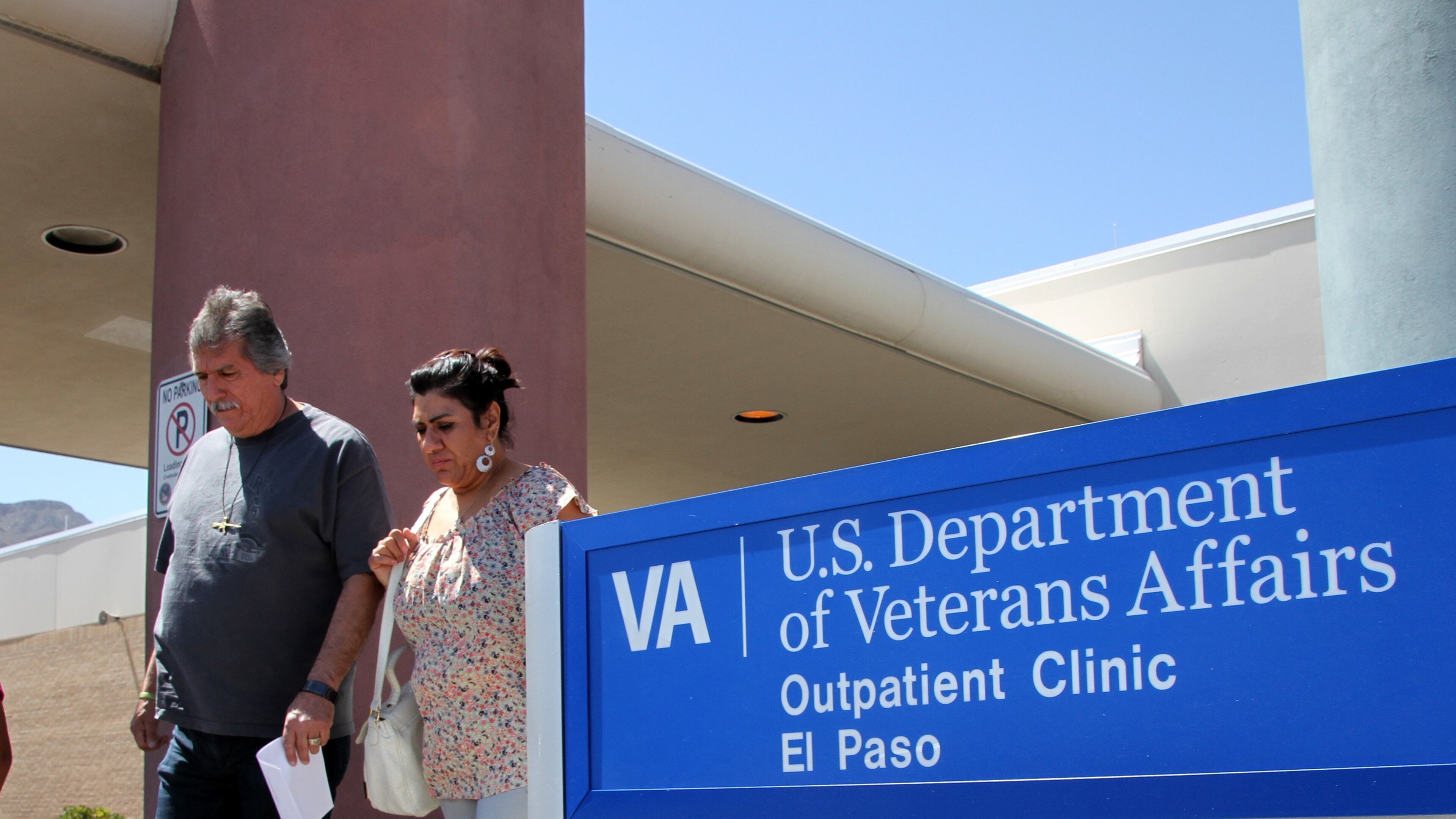 FILE - In this June 9, 2014, file photo, David and Marianne Trujillo exit the Vetarans Affairs facility in El Paso, Texas. An internal Department of Veterans Affairs investigation found that schedulers in Texas routinely misreported when patients actually wanted to see a doctor or get some other type of care, making it impossible to track delays in the care they received. (AP Photo/Juan Carlos Llorca, File)