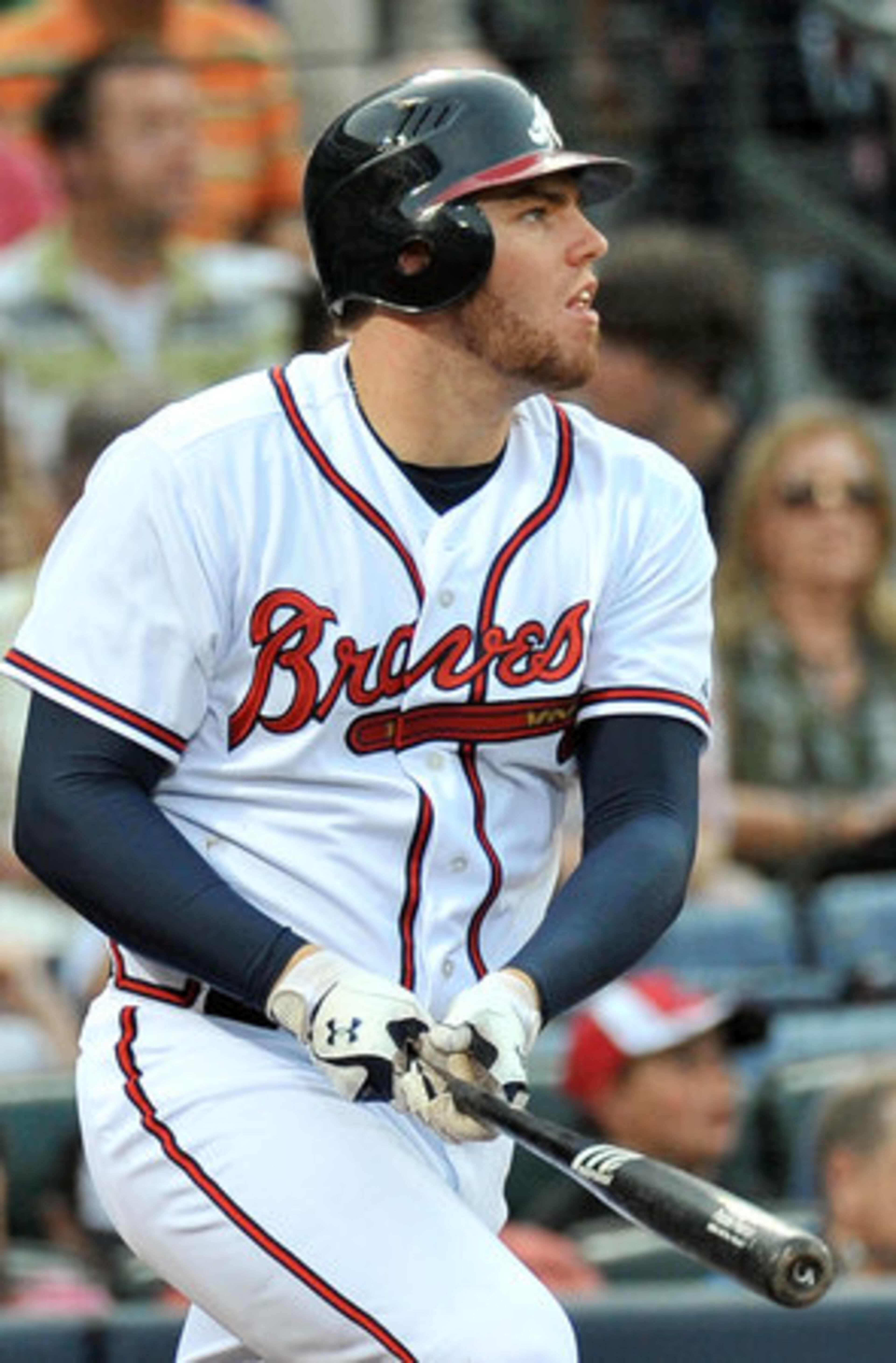 Atlanta Braves Freddie Freeman (5) hits a solo homer against the Chicago Cubs in the 3rd inning of the final game of four-game series at Turner Field in Atlanta on Thursday, July 5, 2012.