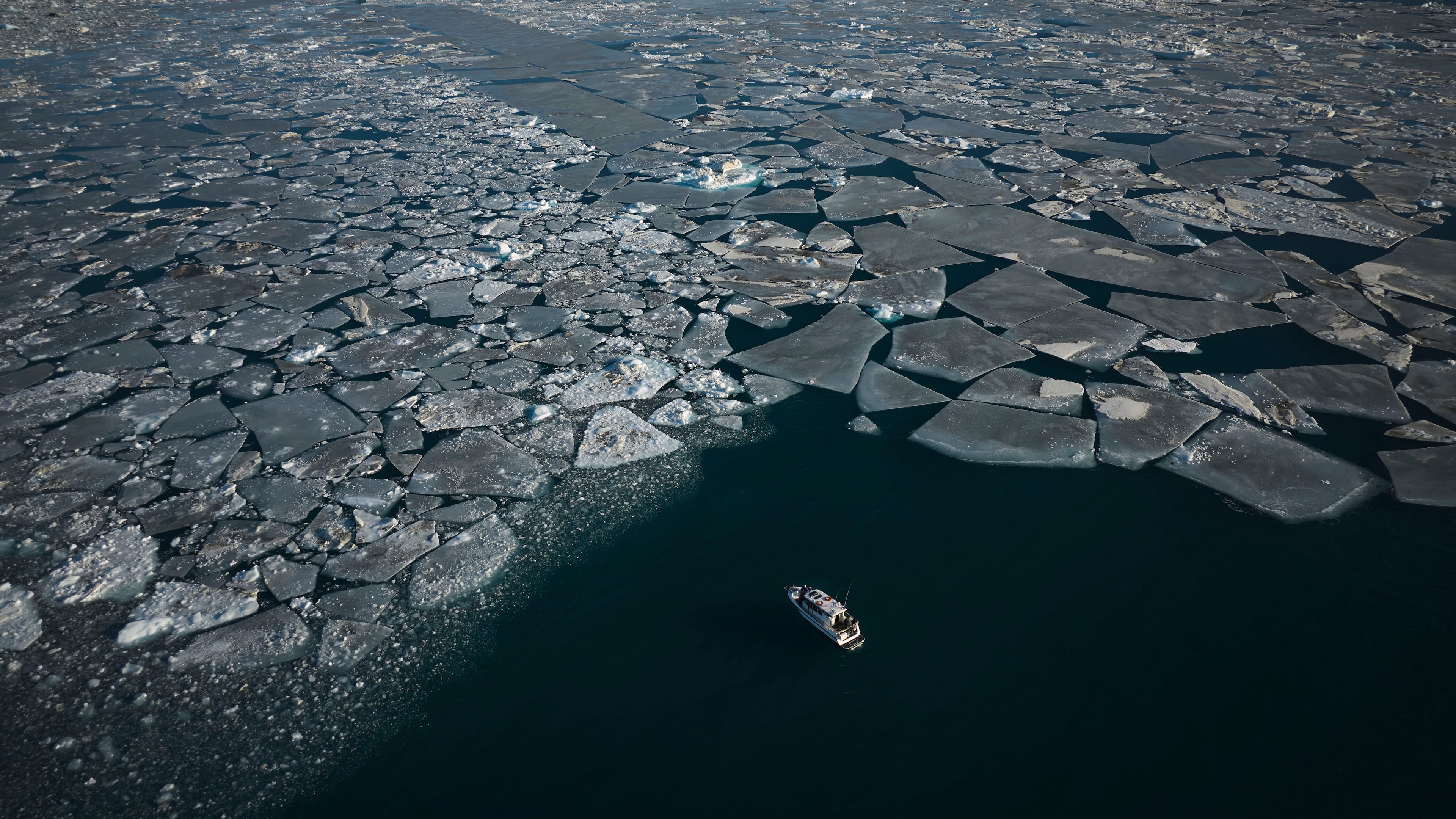 FILE - Pieces of ice move through the sea in Qoornoq Island, near Nuuk, Greenland, Feb. 17, 2025. (AP Photo/Emilio Morenatti, File)