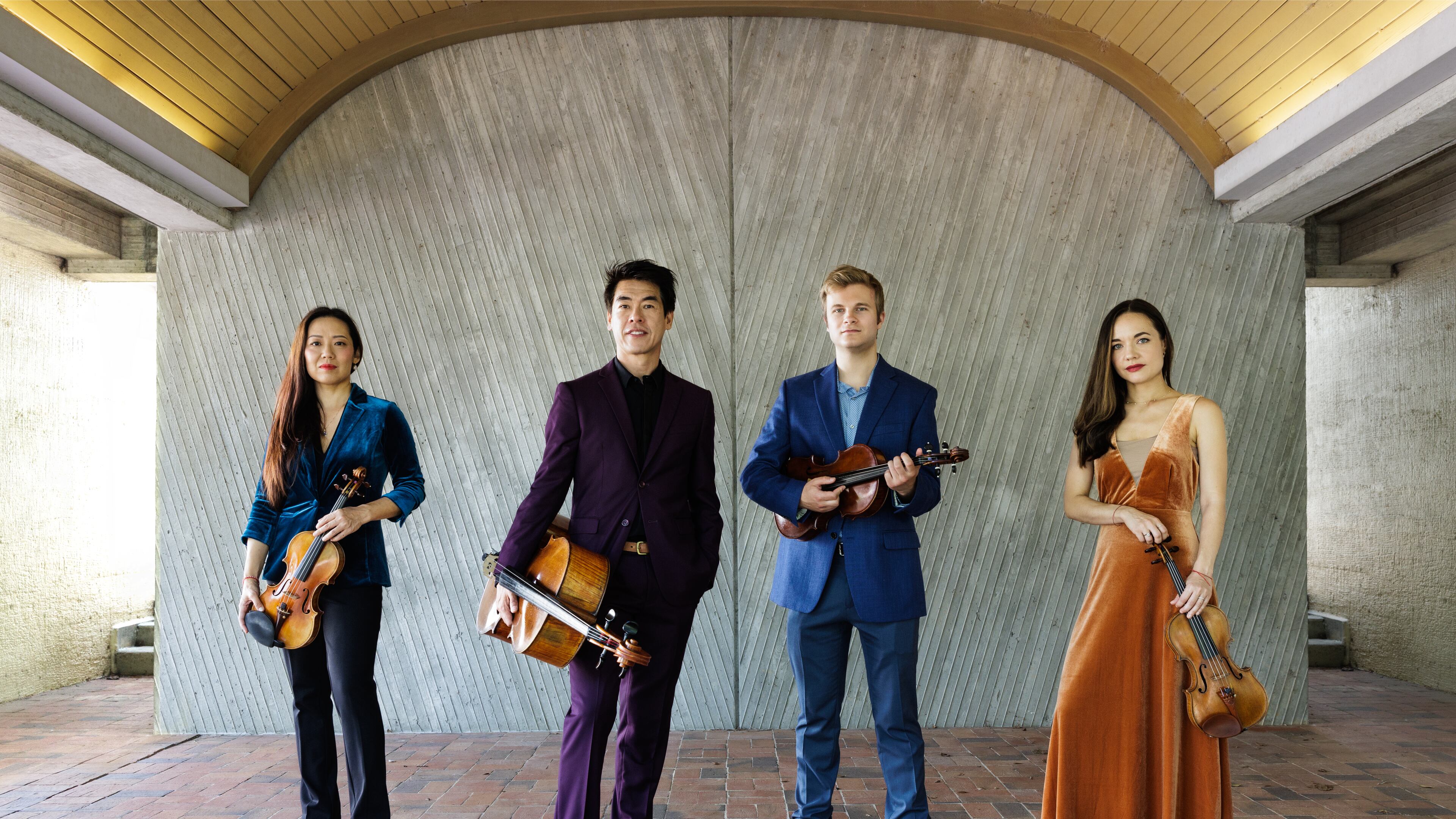 The new Vega Quartet -- Jessica Shuang Wu ((from left), Guang Wang, Joseph Skerik and Emily Daggatt Smith -- performs at the First Presbyterian Church of Atlanta and St. Luke's Episcopal Church. (Photo by Fernando Decillis)