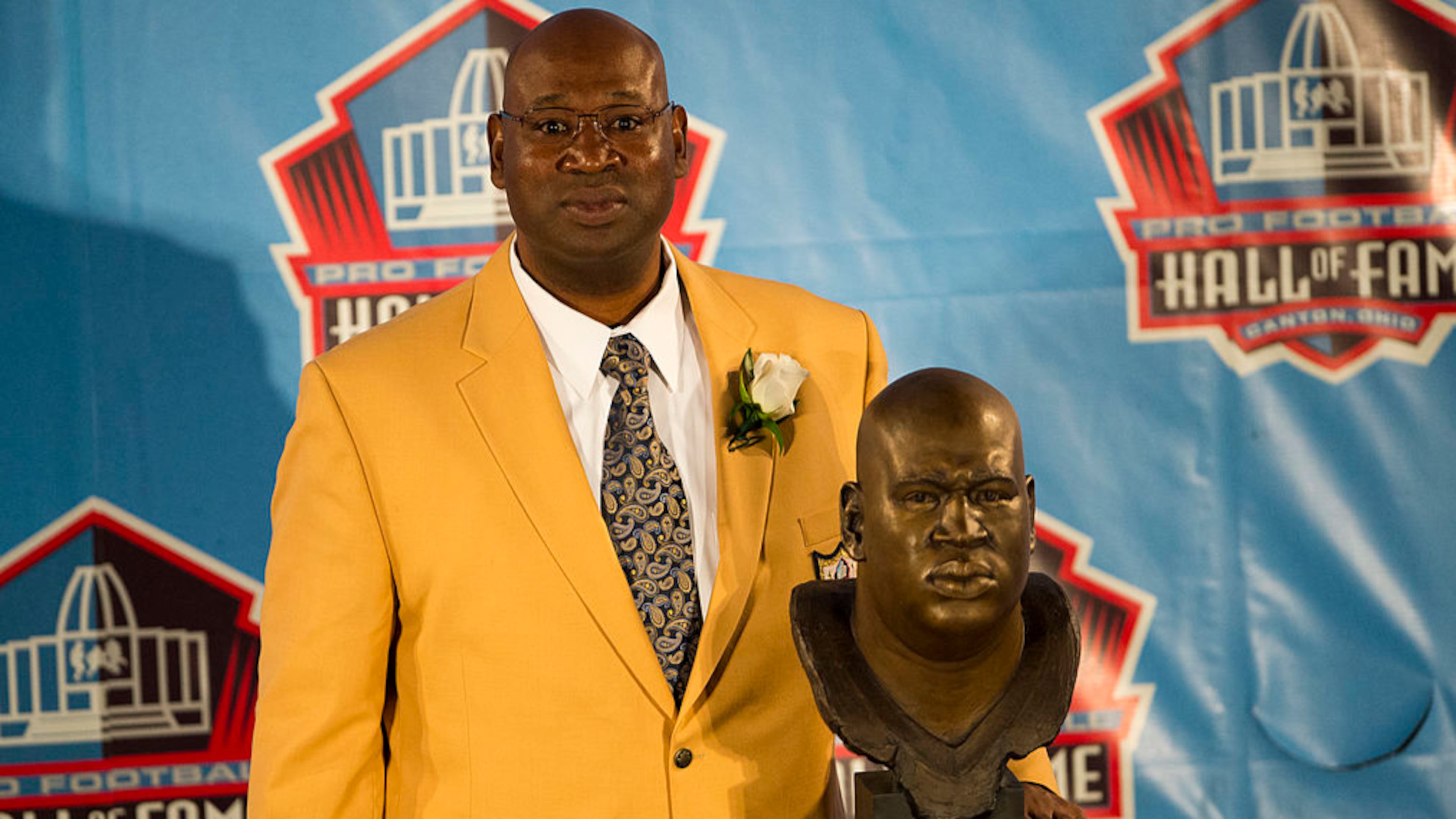 CANTON, OH - AUGUST 4: Former Seattle Seahawks defensive tackle Cortez Kennedy with his bust during the Class of 2012 Pro Football Hall of Fame Enshrinement Ceremony at Fawcett Stadium on August 4, 2012 in Canton, Ohio. (Photo by Jason Miller/Getty Images)