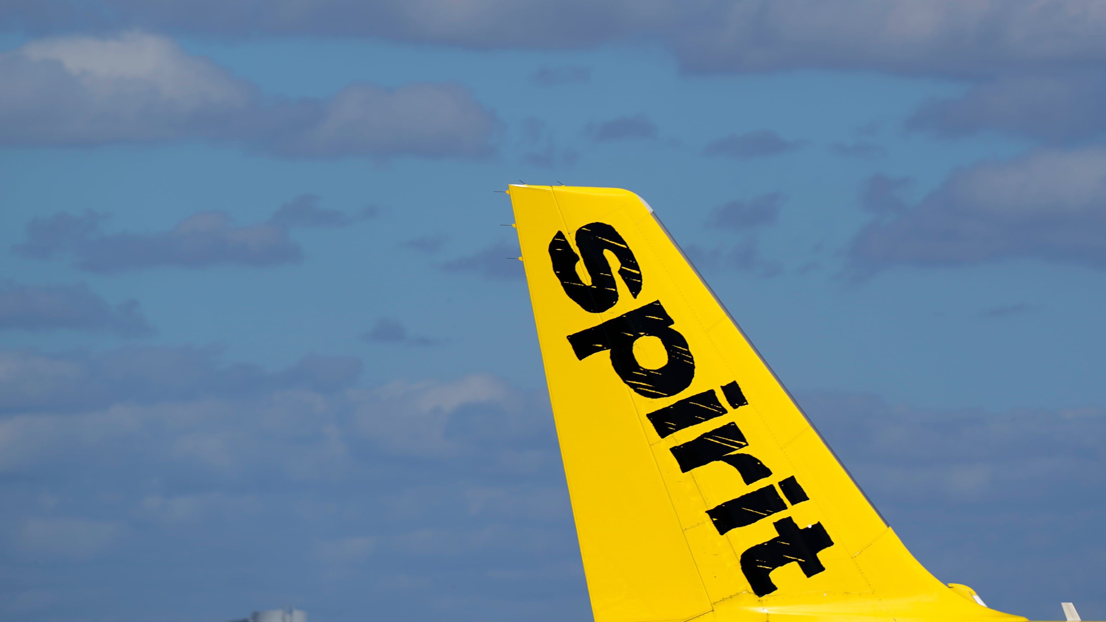 FILE - The tail of a Spirit Airlines Airbus A320 is shown as the plane prepares to take off from Fort Lauderdale-Hollywood International Airport, Jan. 19, 2021, in Fort Lauderdale, Fla. (AP Photo/Wilfredo Lee, File)