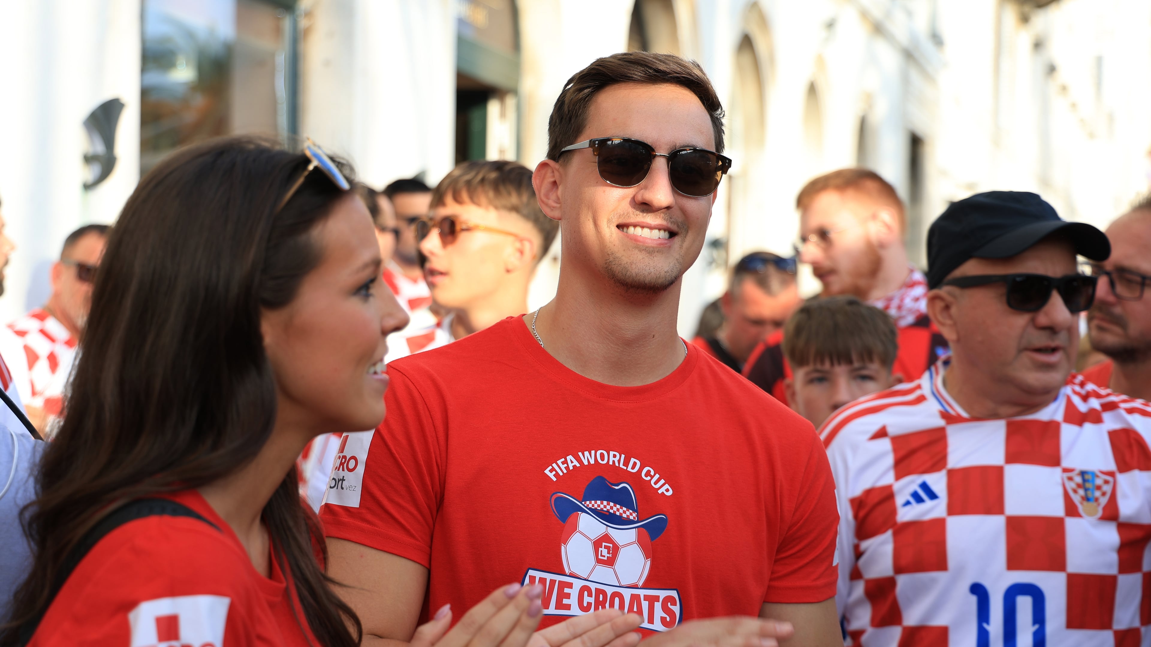 Ashton and Zachary Smith gather with Croatian supporters prior to the Nations League soccer match between Croatia and Spain, in Split, Croatia, Tuesday, Oct. 6, 2026. (AP Photo)