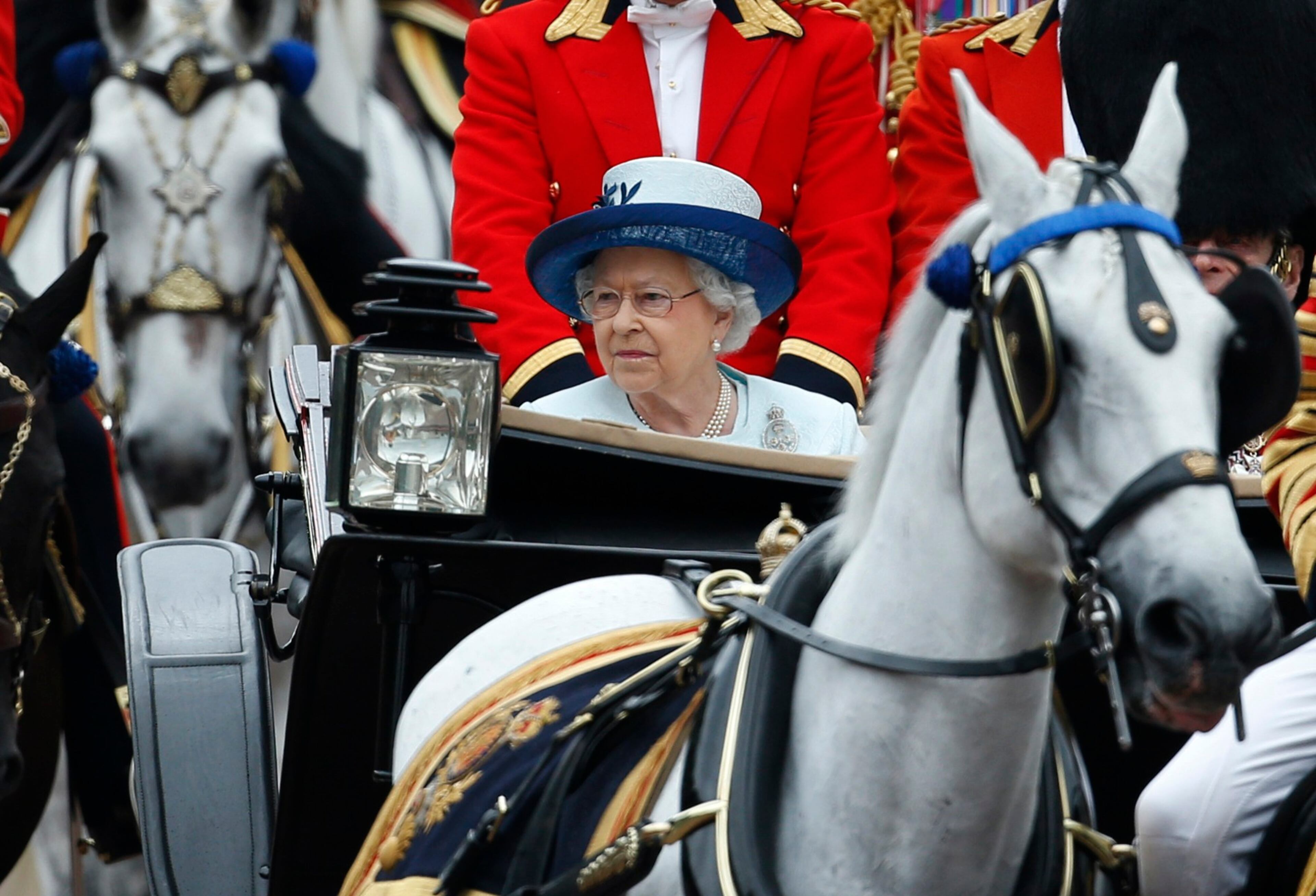 "Trooping the Color" originated from traditional preparations for battle, when flags were carried or "trooped" down the rank for soldiers to see. (AP Photo/Lefteris Pitarakis)