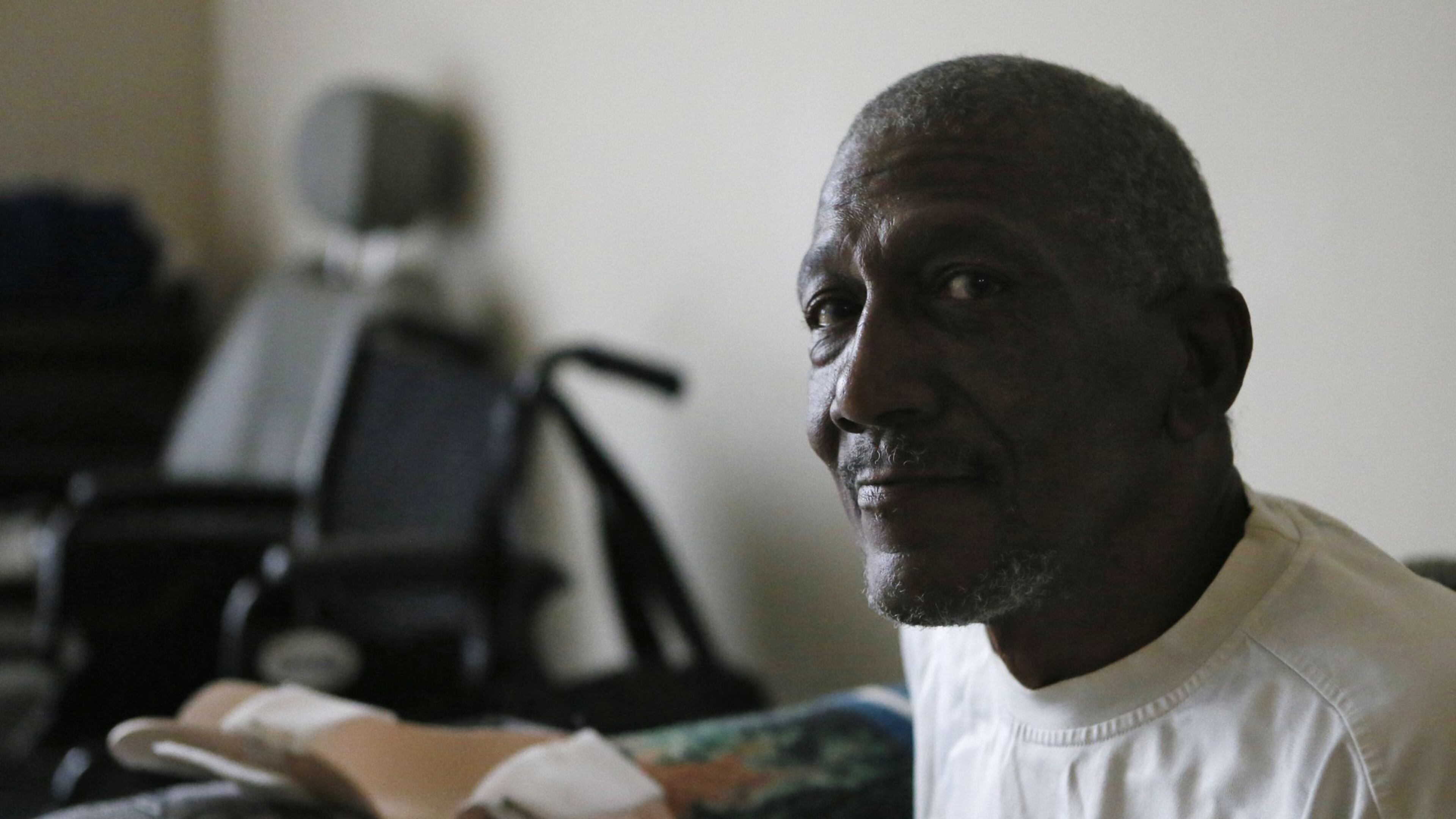 Harold Webster, seated in his apartment, has been on the wait list for meals on wheels since early January. He had a stroke late last year and has very limited movement on his left side, so is wary of cooking. He saw someone delivering Meals on Wheels, and decided to see if he could join. He lives on social security and did handyman work on the side. Now he can’t do that, so his income is lower. BOB ANDRES / BANDRES@AJC.COM
