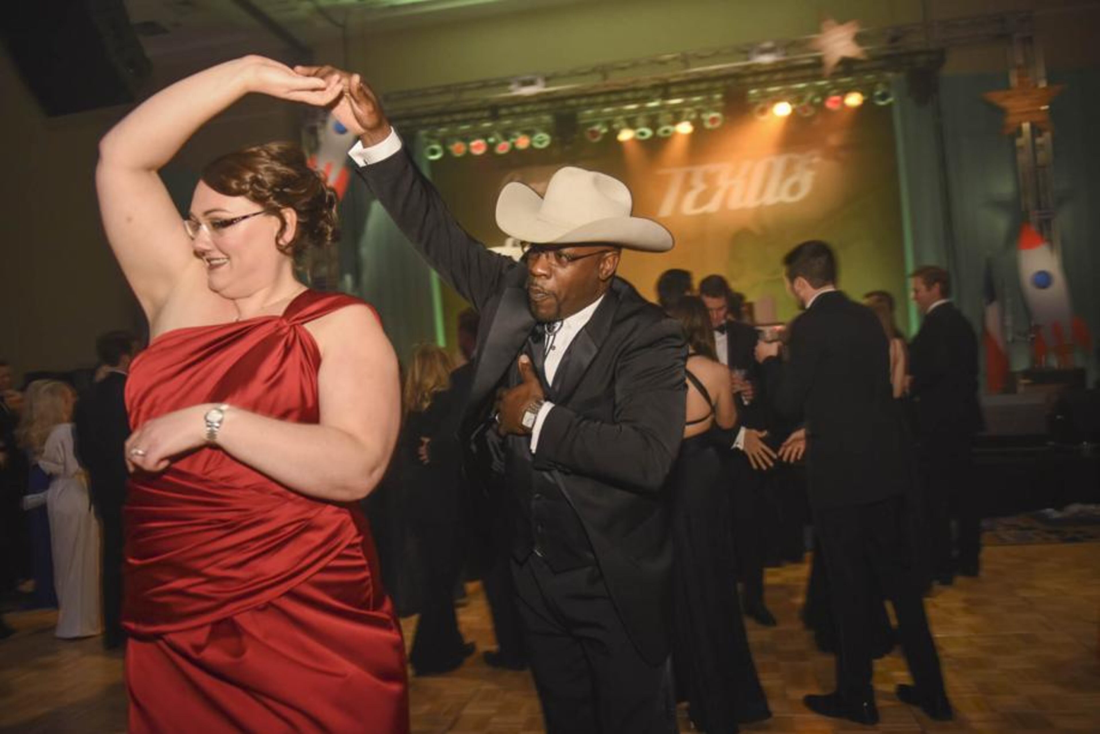 Greg Gordon dances with his wife, Niki Gordon, during the 2017 Black Tie & Boots Presidential Inaugural Ball at the The Gaylord National Resort & Convention Center in Oxon Hill, Md., on Thursday, Jan. 19, 2017. (AP Photo/Kevin Wolf)