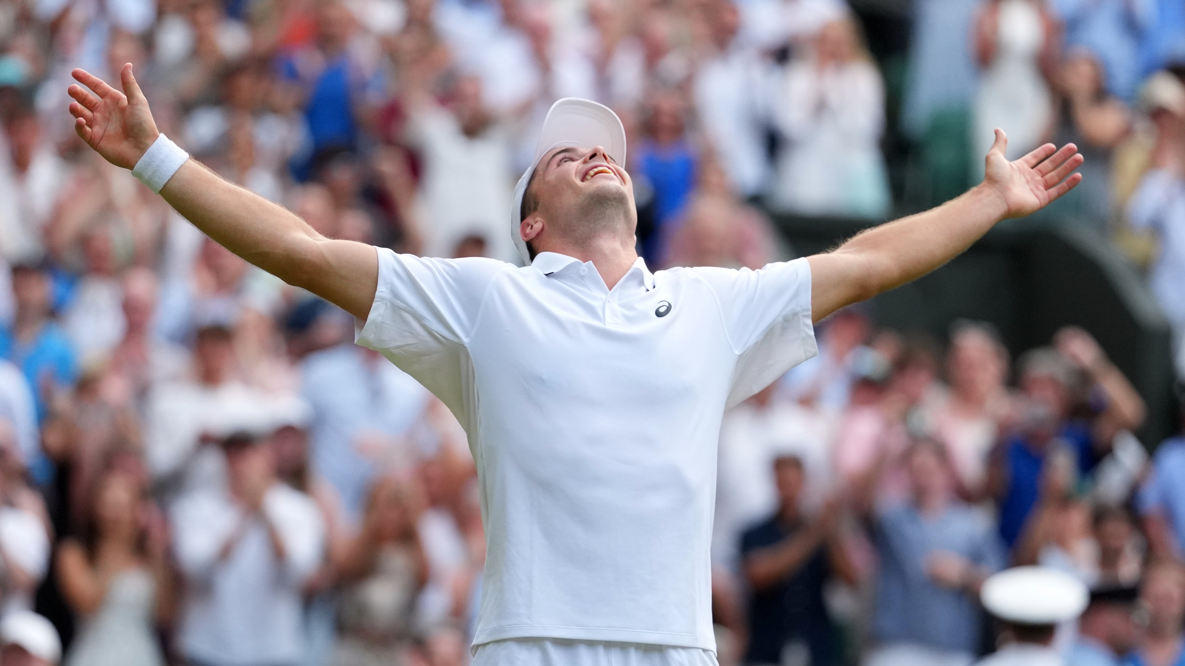 Arthur Fery of Britain celebrates winning the men's singles fourth round match against Grigor Dimitrov of Bulgaria at the Wimbledon Tennis Championships in London, Monday, July 6, 2026.(AP Photo/Kirsty Wigglesworth)