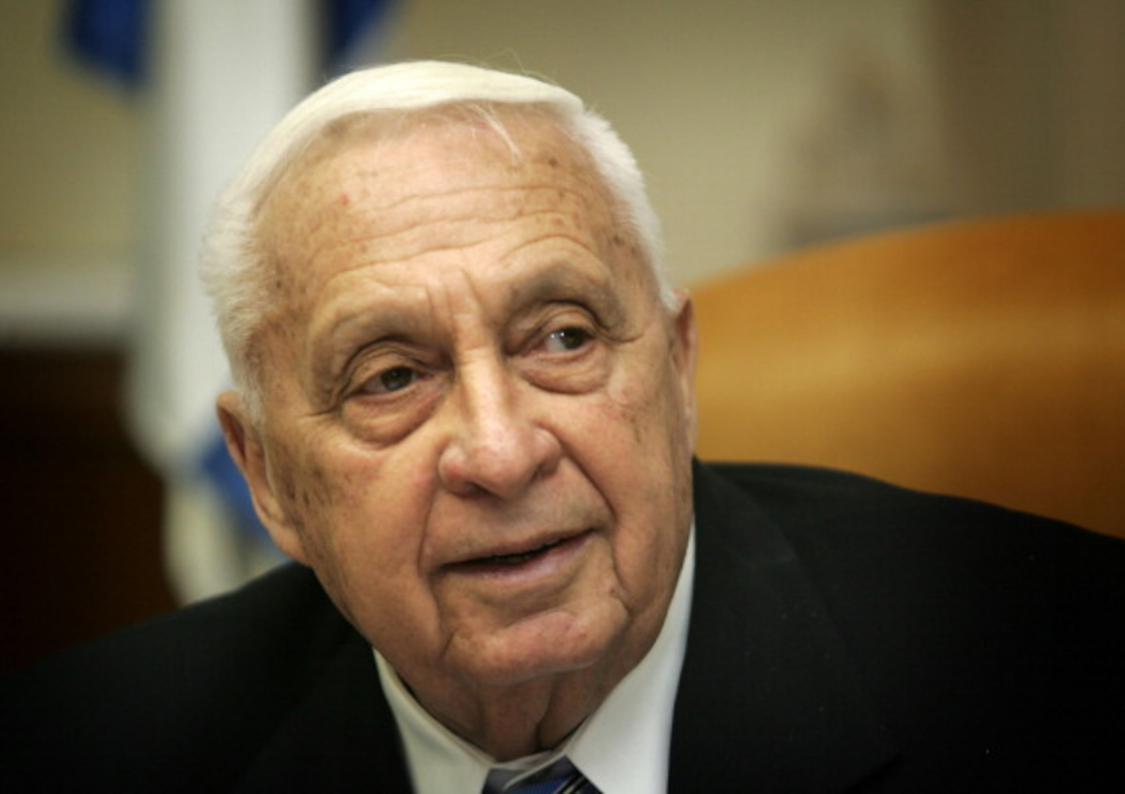 Israeli Prime Minister Ariel Sharon attends a cabinet meeting in Jerusalem 13 November 2005. The defeat of Vice Premier Shimon Peres during last week's primary elections in the race to lead Israel's Labor Party, could bring down Sharon's shaky coalition and propel the country into early elections. AFP PHOTO/Baz Ratner-POOL (Photo credit should read BAZ RATNER/AFP/Getty Images)