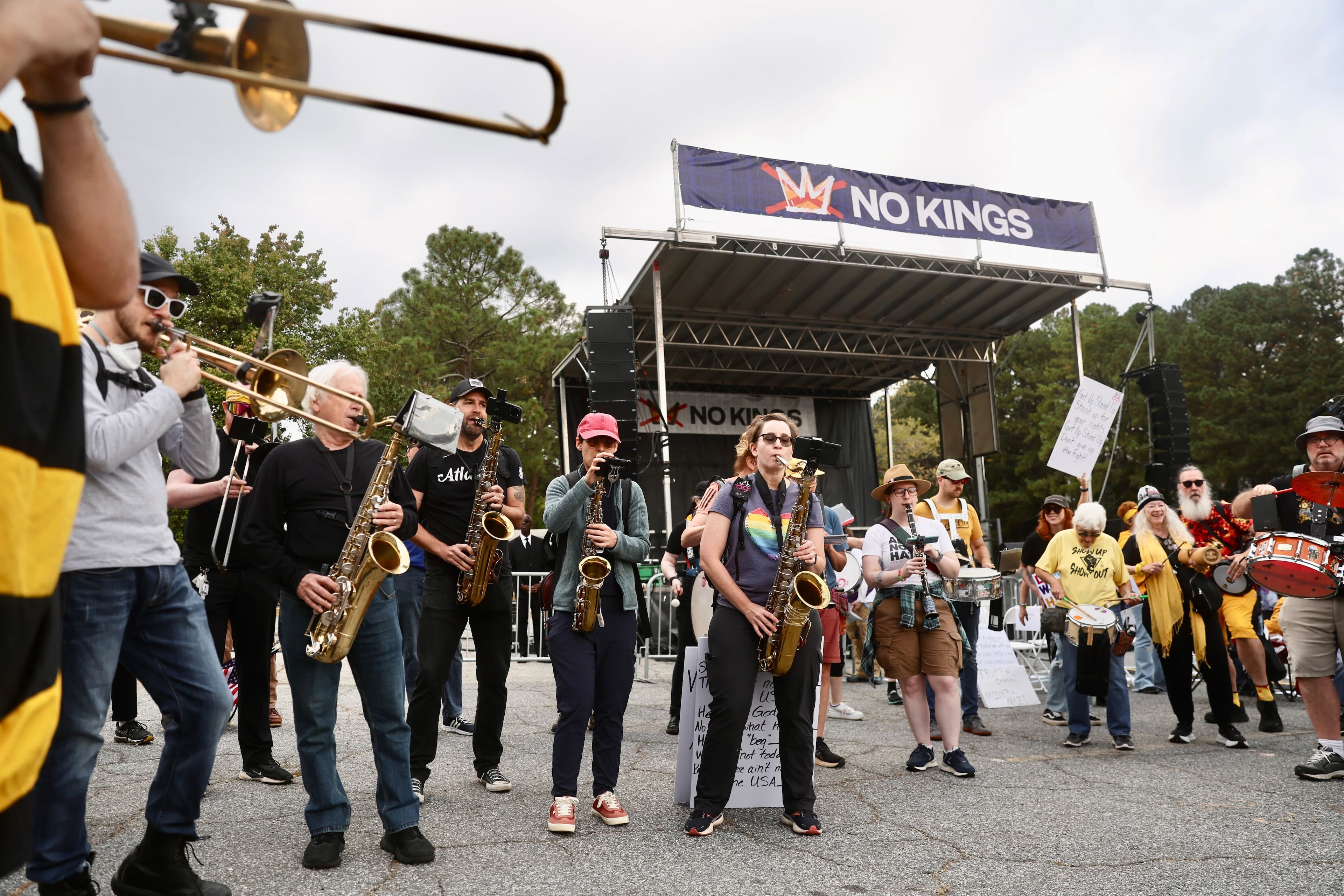 "No Kings" protests took place nationwide, with many of them being held in metro Atlanta. Saturday morning. (Abbey Cutrer/AJC)