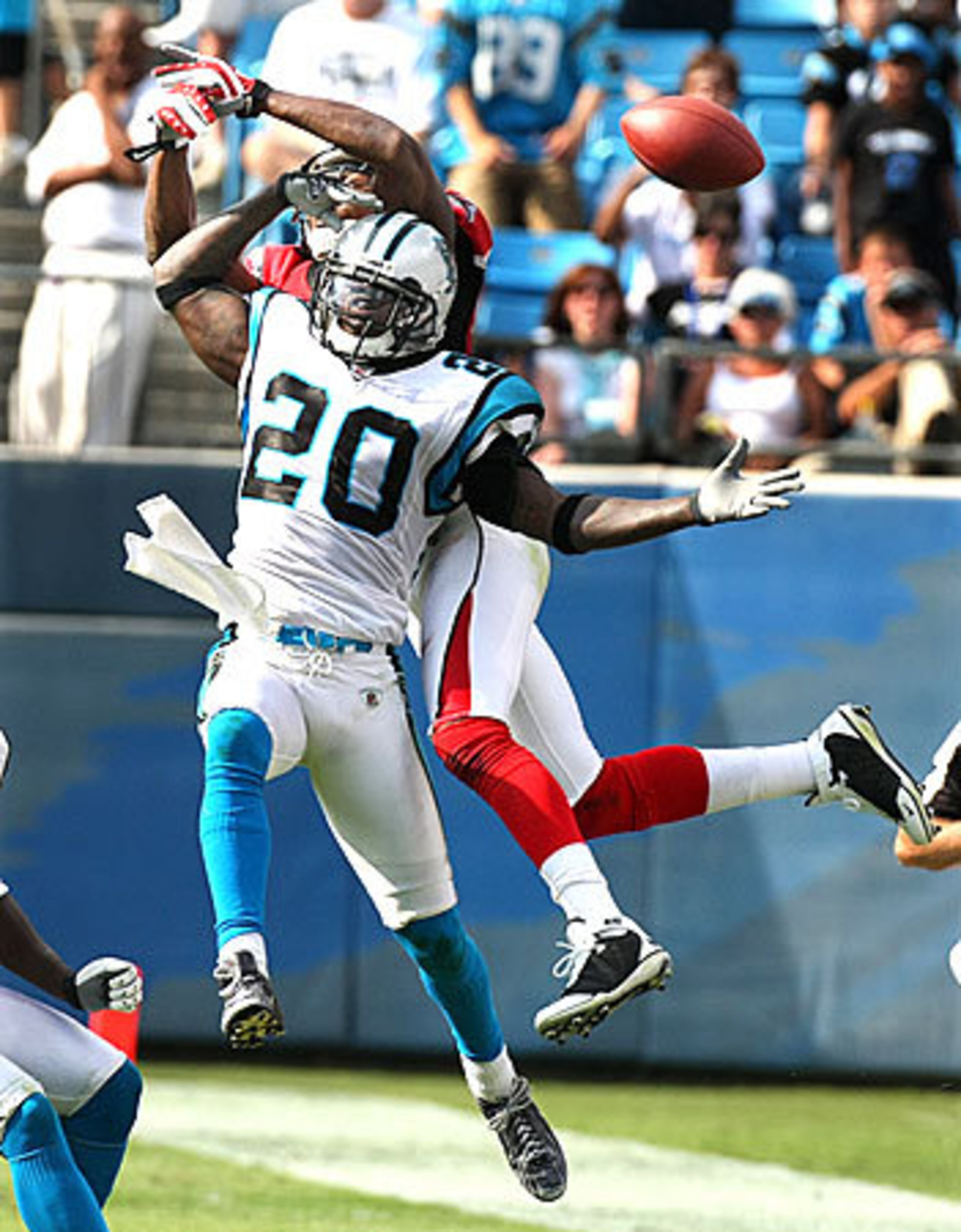 Panthers cornerback Chris Gamble breaks up a pass to Falcons wide receiver Roddy White.