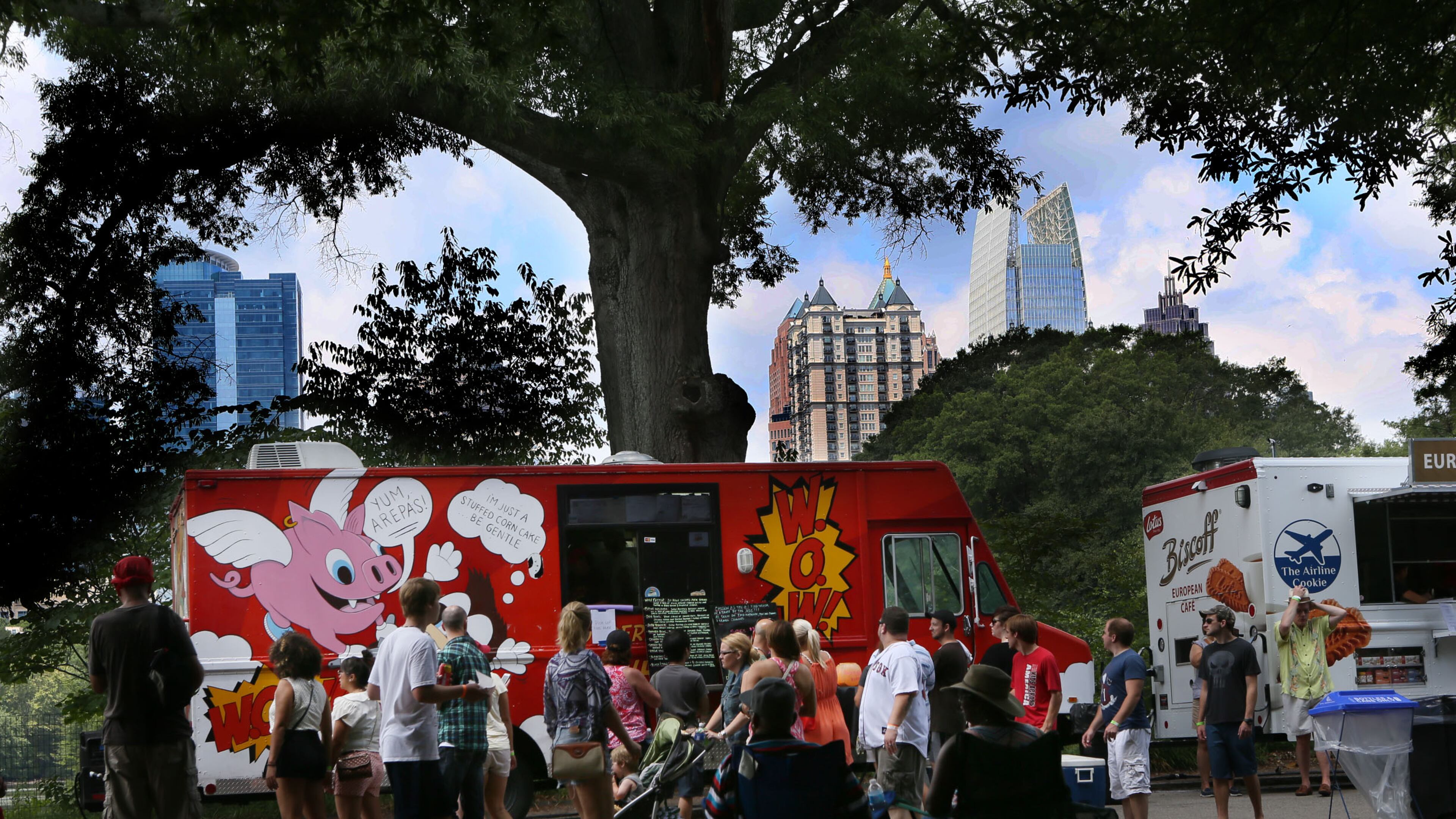 Hundreds attended the third annual Atlanta Street Food Festival at Piedmont Park. More than 40 food trucks lined the park's walkway to offer a wide variety of cuisine. (Photo by Phil Skinner)