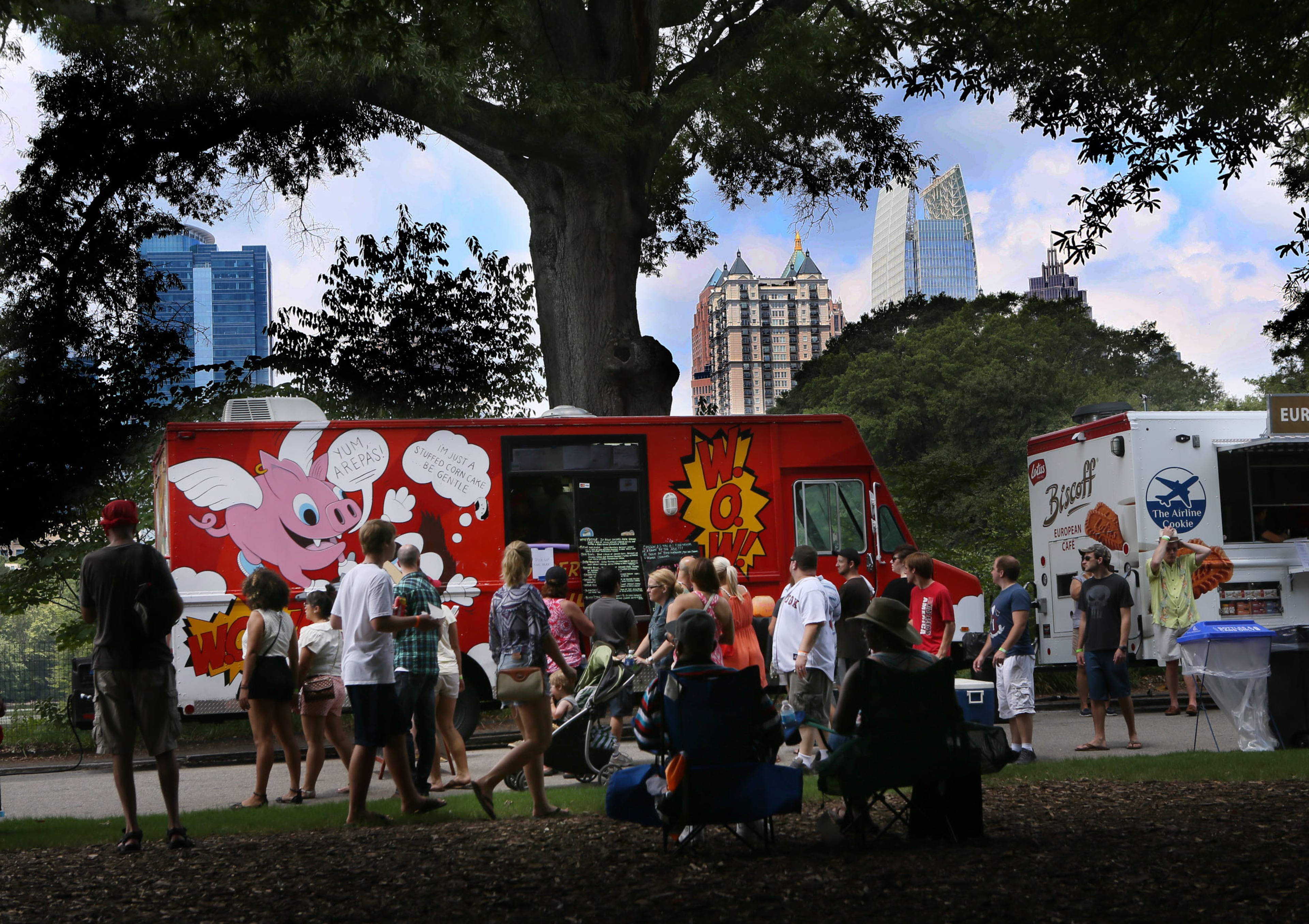 Hundreds attended the third annual Atlanta Street Food Festival at Piedmont Park. More than 40 food trucks lined the park's walkway to offer a wide variety of cuisine. (Photo by Phil Skinner)