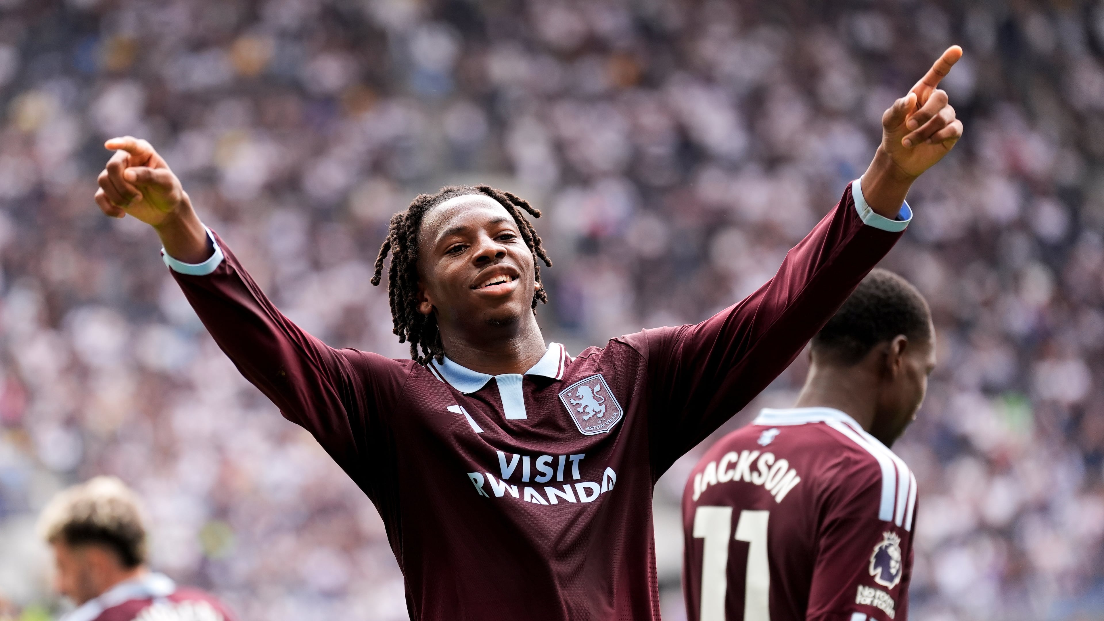 Aston Villa's Johan Manzambi celebrates as he scores the opening goal during the English Premier League soccer match between Tottenham Hotspur and Aston Villa, at Tottenham Hotspur Stadium in London, Saturday, Sept. 19, 2026. (Andrew Matthews/PA via AP)