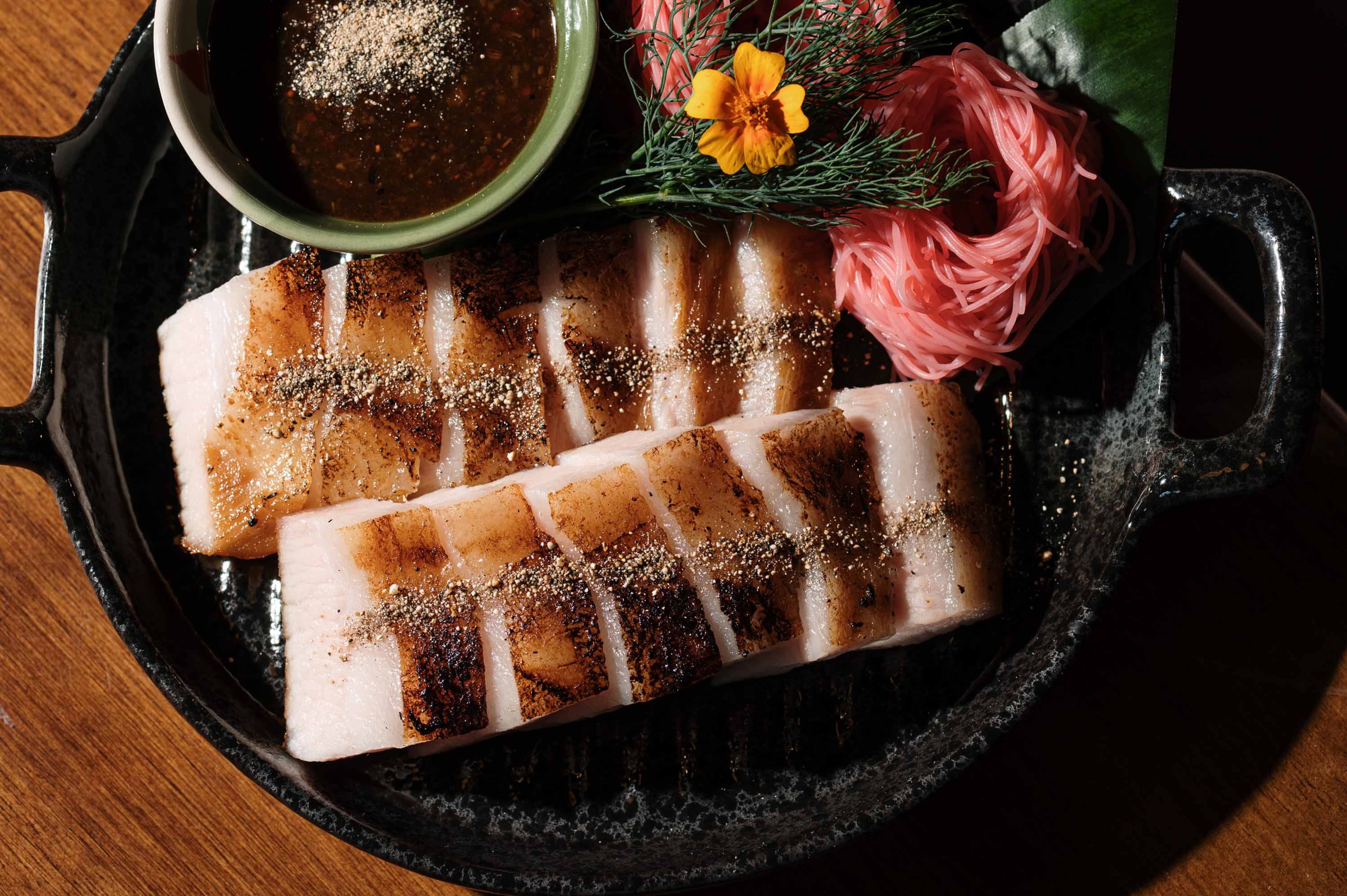 The Isaan pork jowel can be difficult to find, Niyomkun said, but it's a favored cut of meat. (Courtesy of Tipsy Thaiger)