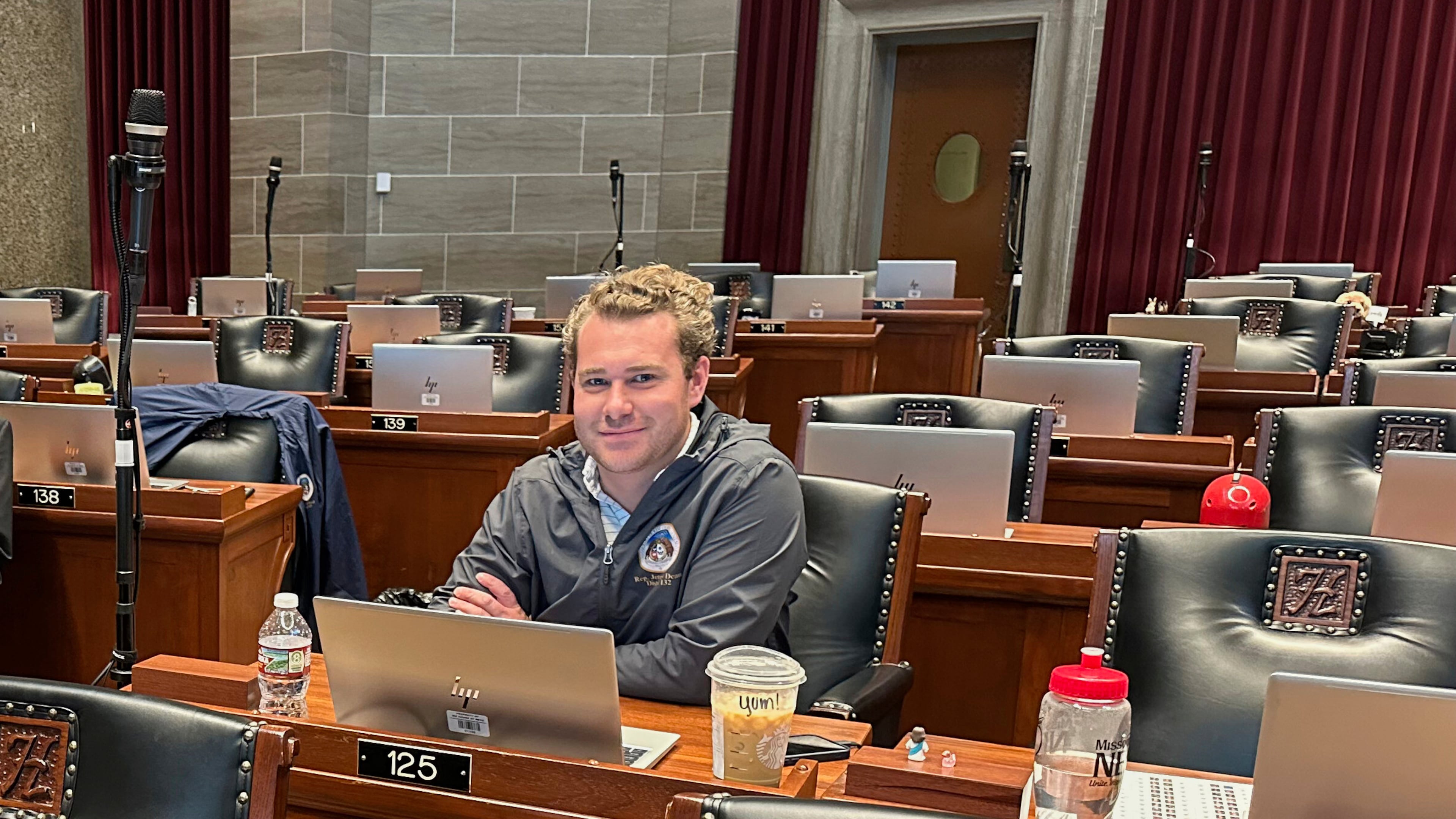 FILE - Missouri state Rep. Jeremy Dean, D-Springfield, glances up from his computer in the Missouri House chamber during a special legislation session, Sept. 8, 2025 in Jefferson City, Mo. (AP Photo/David A. Lieb, File)