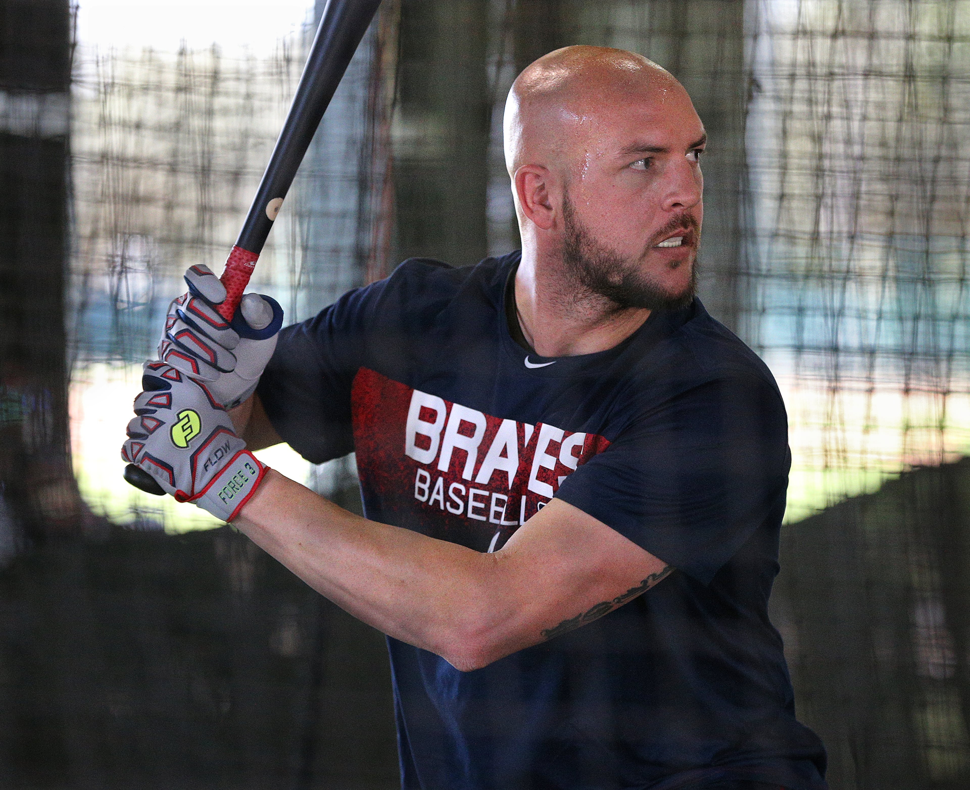 Tyler Flowers focused in the batting cage. (Curtis Compton/ccompton@ajc.com)