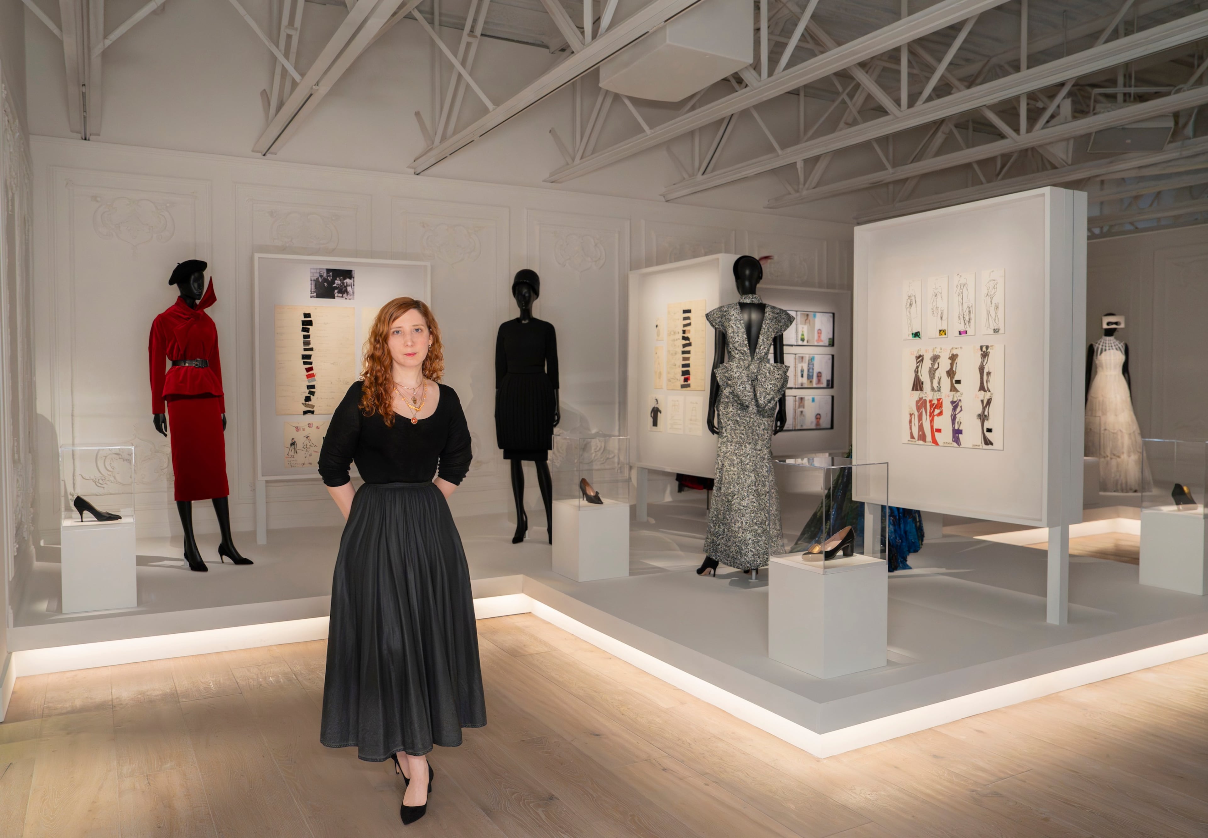 “It’s really important that this knowledge of couture gets shared,” says exhibition curator Hélène Starkman, shown at the Dior exhibit. (Courtesy of SCAD FASH Museum of Fashion + Film)