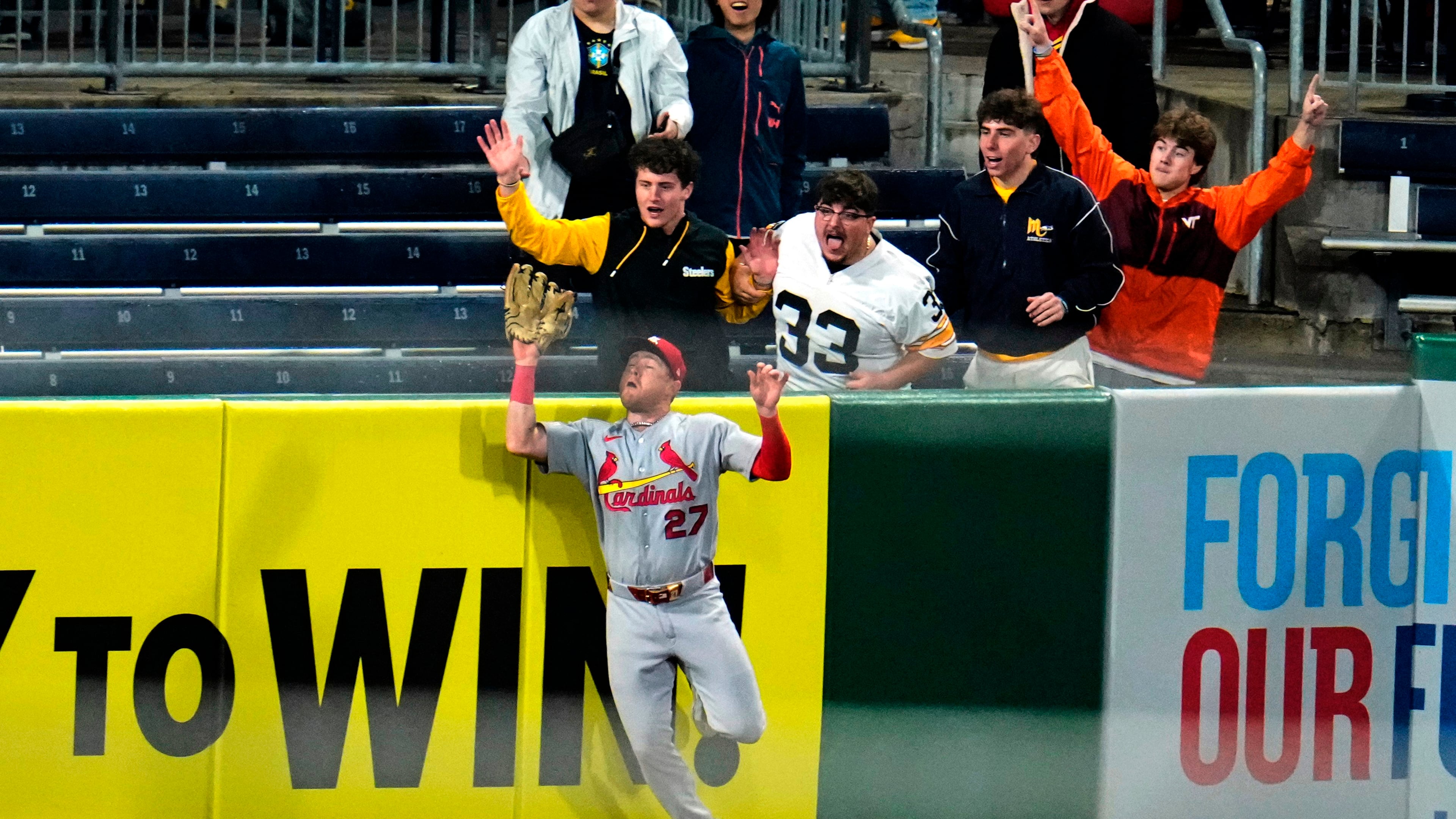 St. Louis Cardinals left fielder Nathan Church (27) leaps to make the catch on a fly ball by Pittsburgh Pirates' Nick Gonzales to end the baseball game in Pittsburgh, Wednesday, April 29, 2026. (AP Photo/Gene J. Puskar)