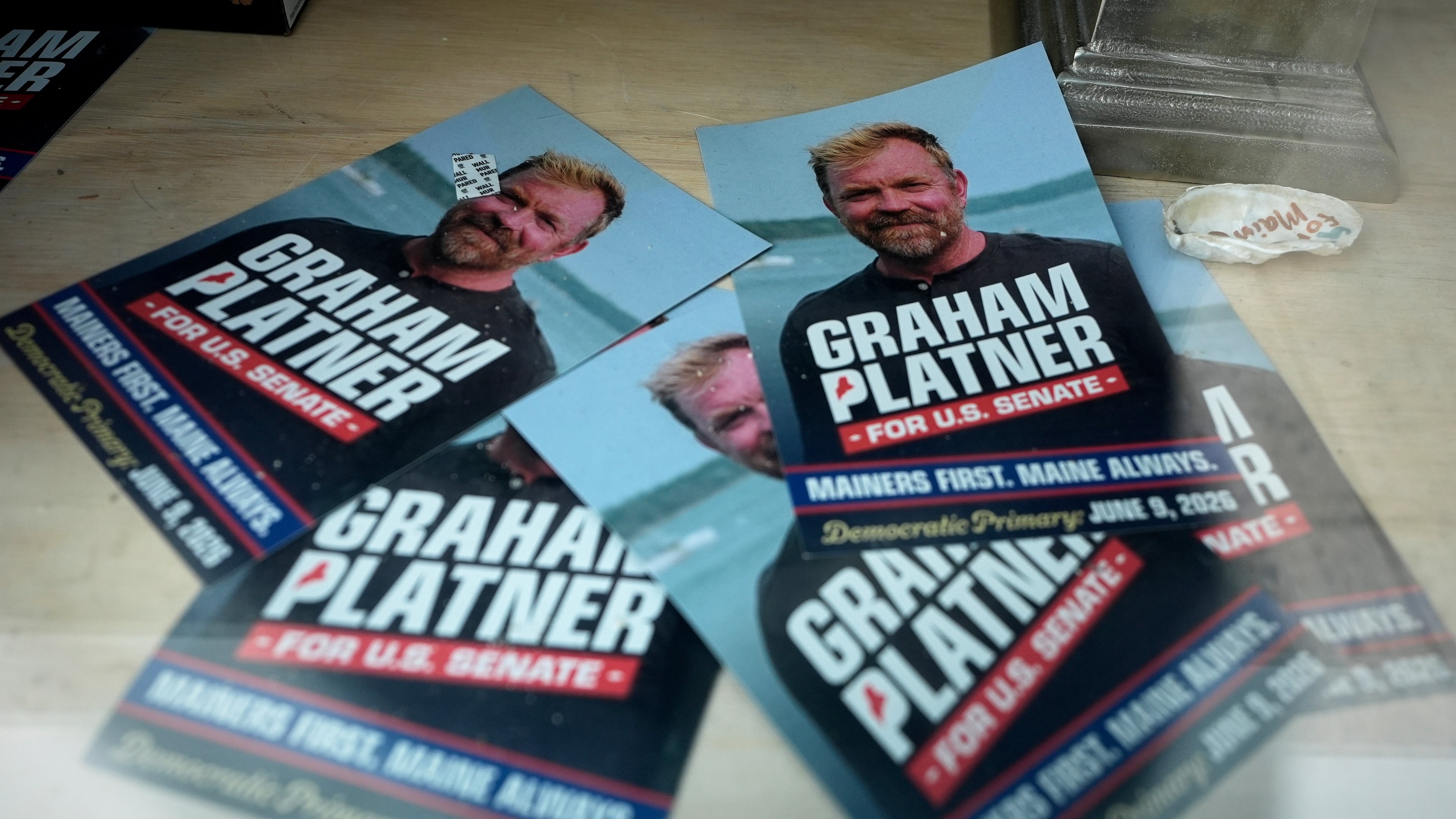 Campaign flyers for former Democratic candidate for U.S. Senate Graham Platner are seen at his headquarters Thursday, July 9, 2026, in Ellsworth, Maine. (AP Photo/Robert F. Bukaty)