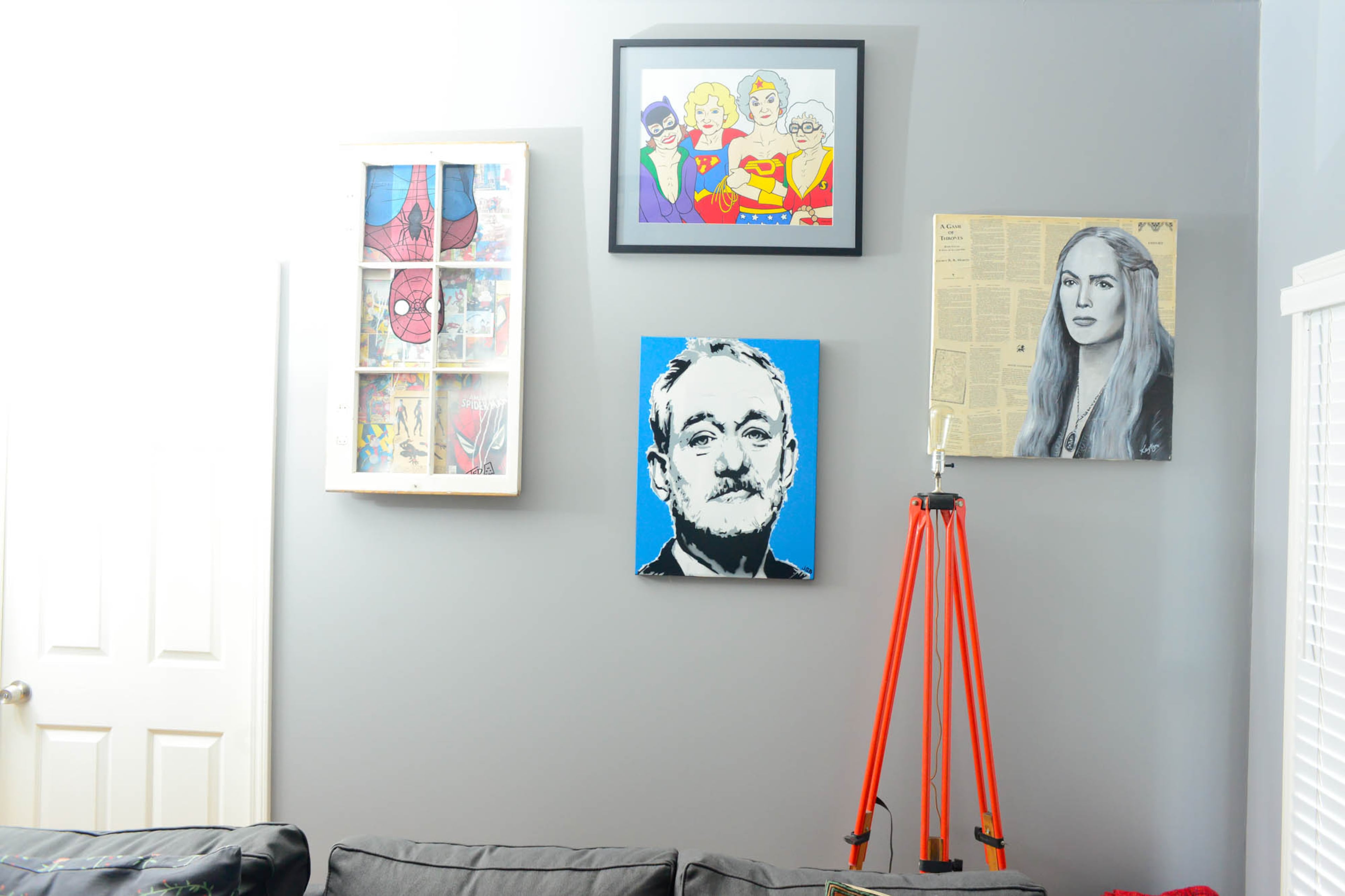 Pop culture art on the walls include a depiction of the Golden Girls as superheroes by Trevor Wayne, a portrait of Bill Murray, Spider-Man hanging in a window and a "Game of Thrones" print Gillese bought as a gift for Nash - a throwback to their early days of dating when they would watch the show together.