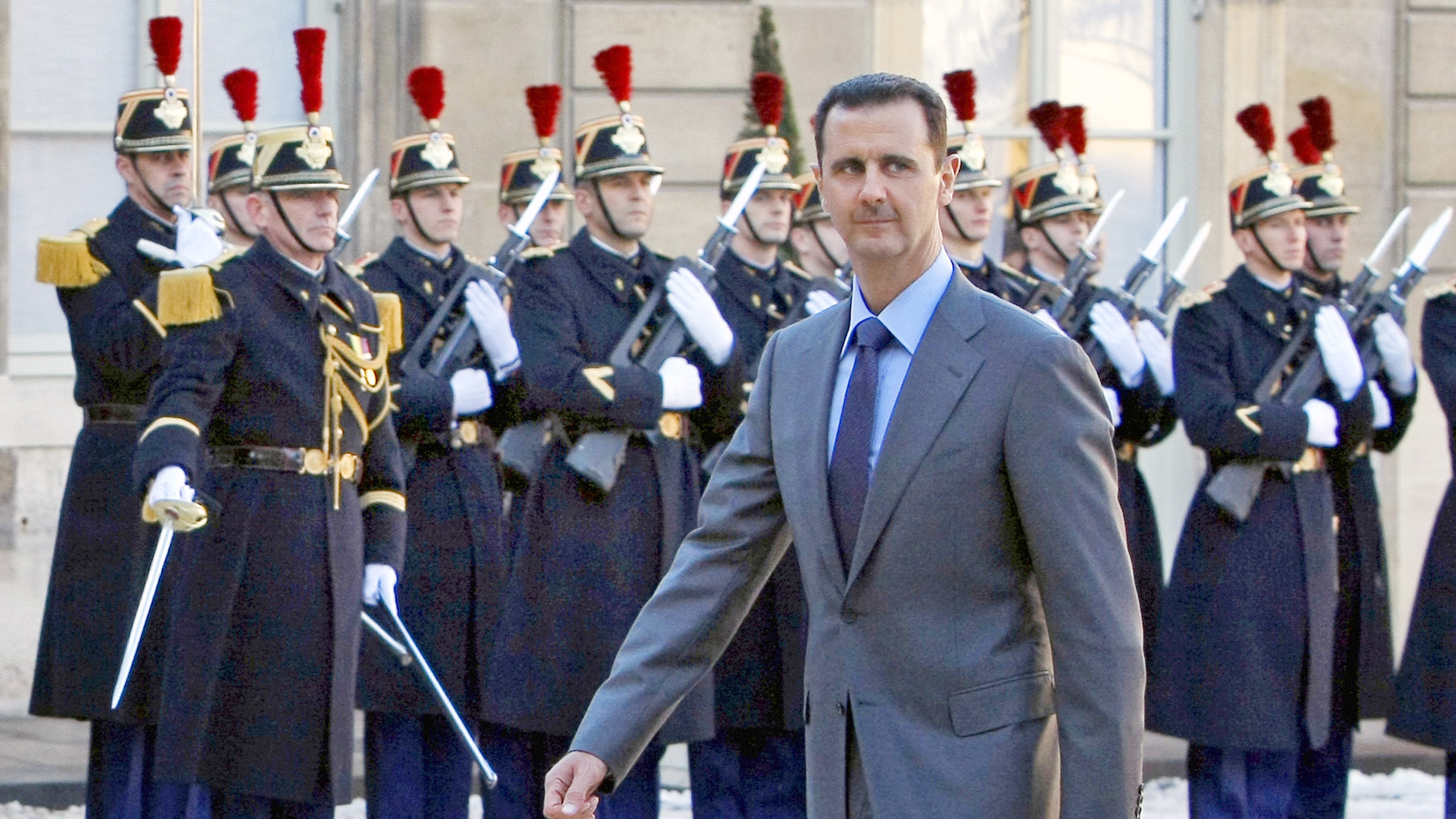 FILE - In this Dec. 9, 2010 file photo, Syria President Bashar al-Assad arrives at the Elysee Palace in Paris for his meeting with French President Nicolas Sarkozy. (AP Photo/Remy de la Mauviniere, File)