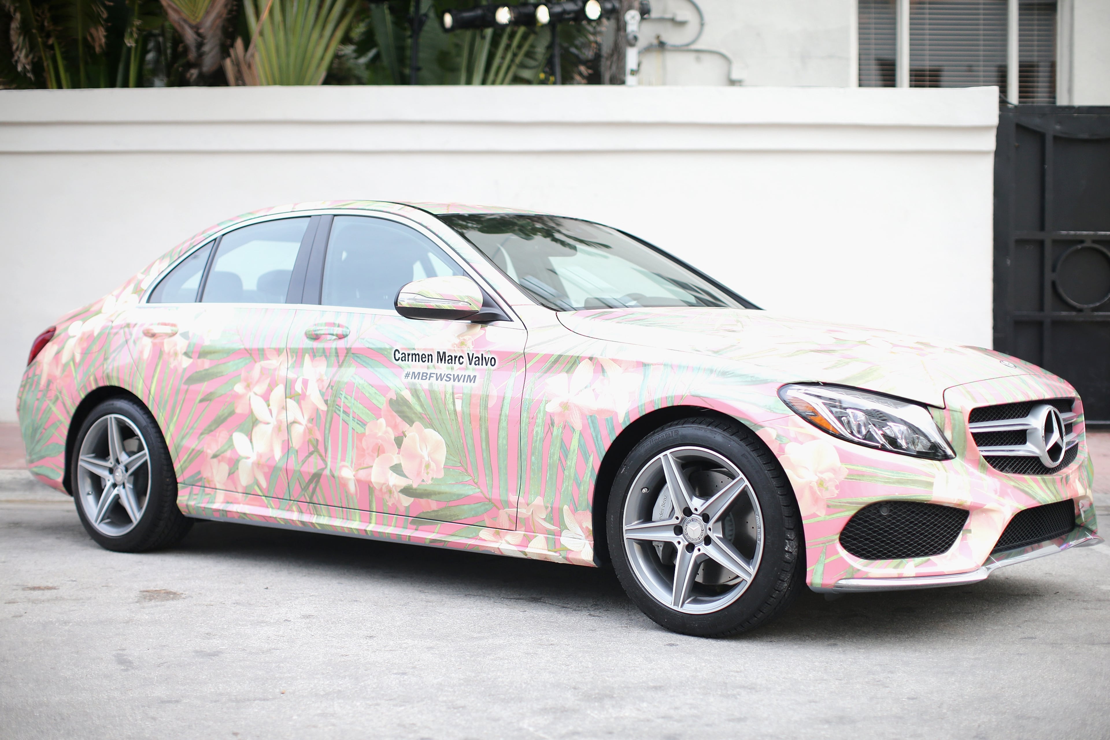 MIAMI BEACH, FL - JULY 17: A 2015 Mercedes-Benz C-Class featuring an exclusive design by Carmen Marc Valvo on display during Mercedes-Benz Fashion Week Swim 2015 at The Raleigh on July 17, 2014 in Miami Beach, Florida. (Photo by Neilson Barnard/Getty Images for Mercedes-Benz Fashion Week )