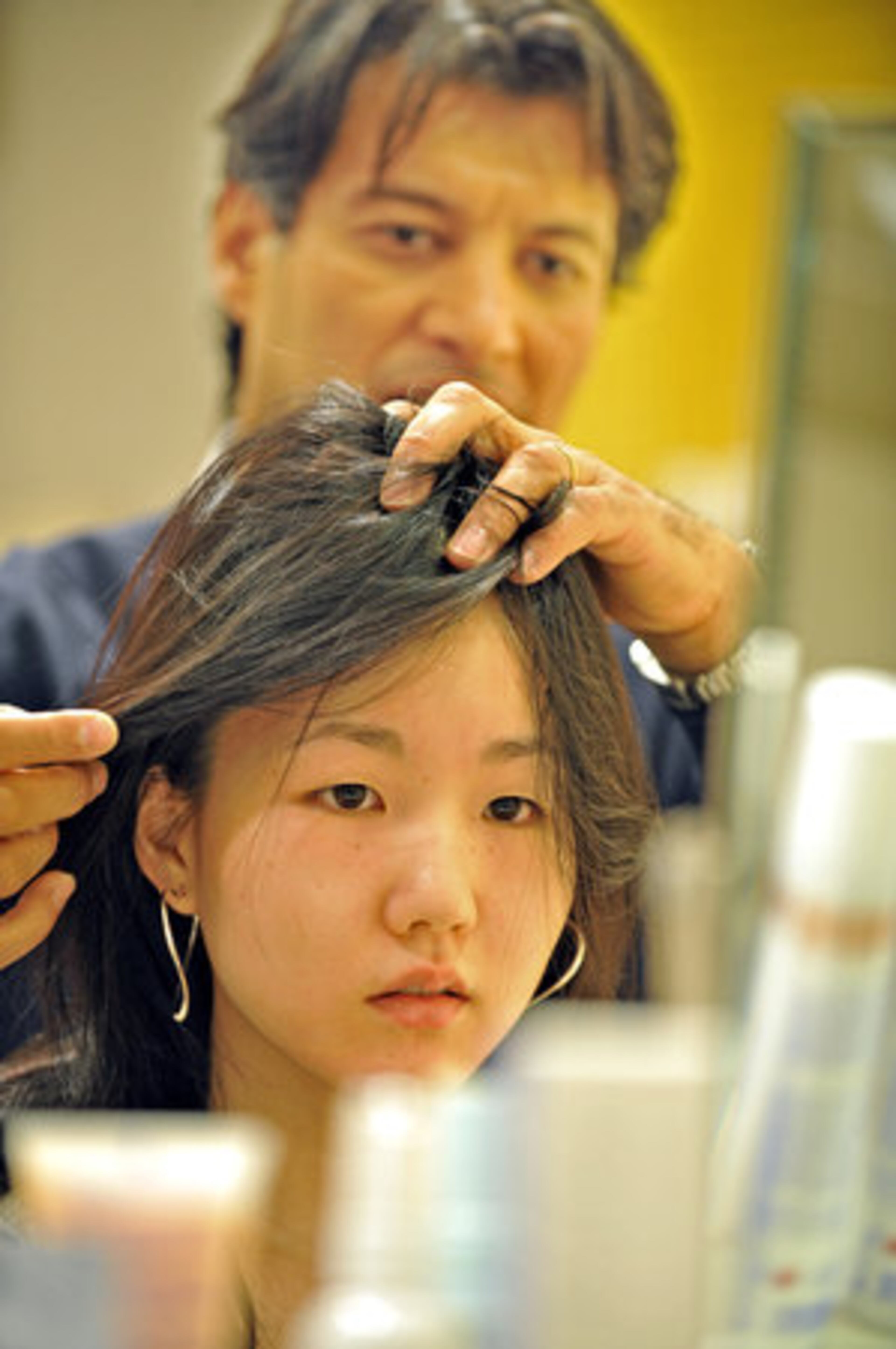 Fekkai shows Kate Seo how to maximize the beauty of her hair. He says women should not overdo it on hair care products, even his own. "The biggest challenge is really that people are too insecure and confused about their look. It is a challenge to really give them a great sense of confidence that they can look beautiful," Fekkai told AJC reporter Nedra Rhone.