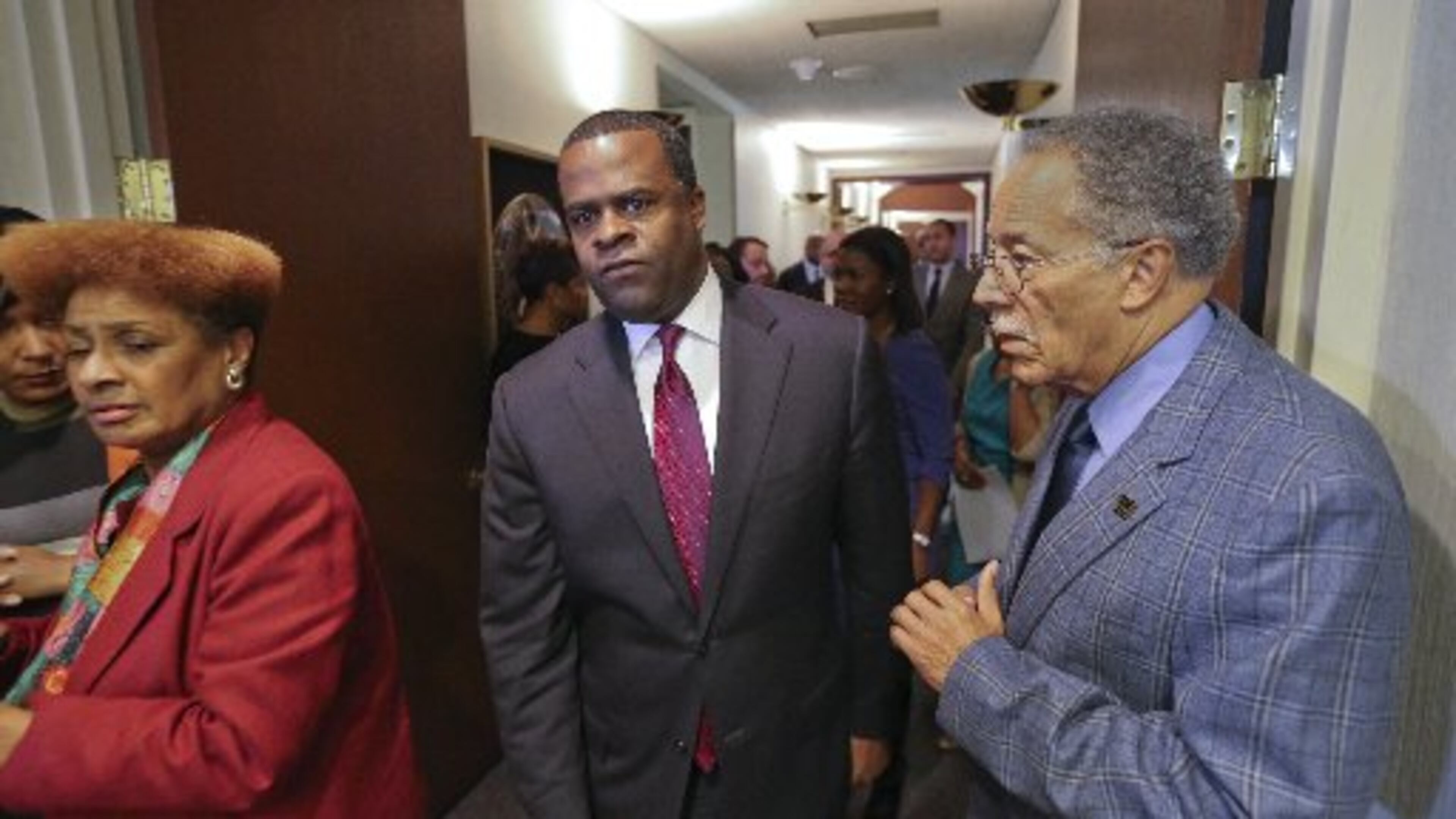 Atlanta Councilman C.T. Martin (right) announced Tuesday that his campaign will return a controversial donation from a ballot committee with ties to Mayor Kasim Reed (center). Reed directed the committee to contribute to seven council members, six of whom have now said they will return the money or donate it to charity. Only councilwoman Cleta Winslow (left) has not answered the AJC’s questions about what her campaign will do with the money.