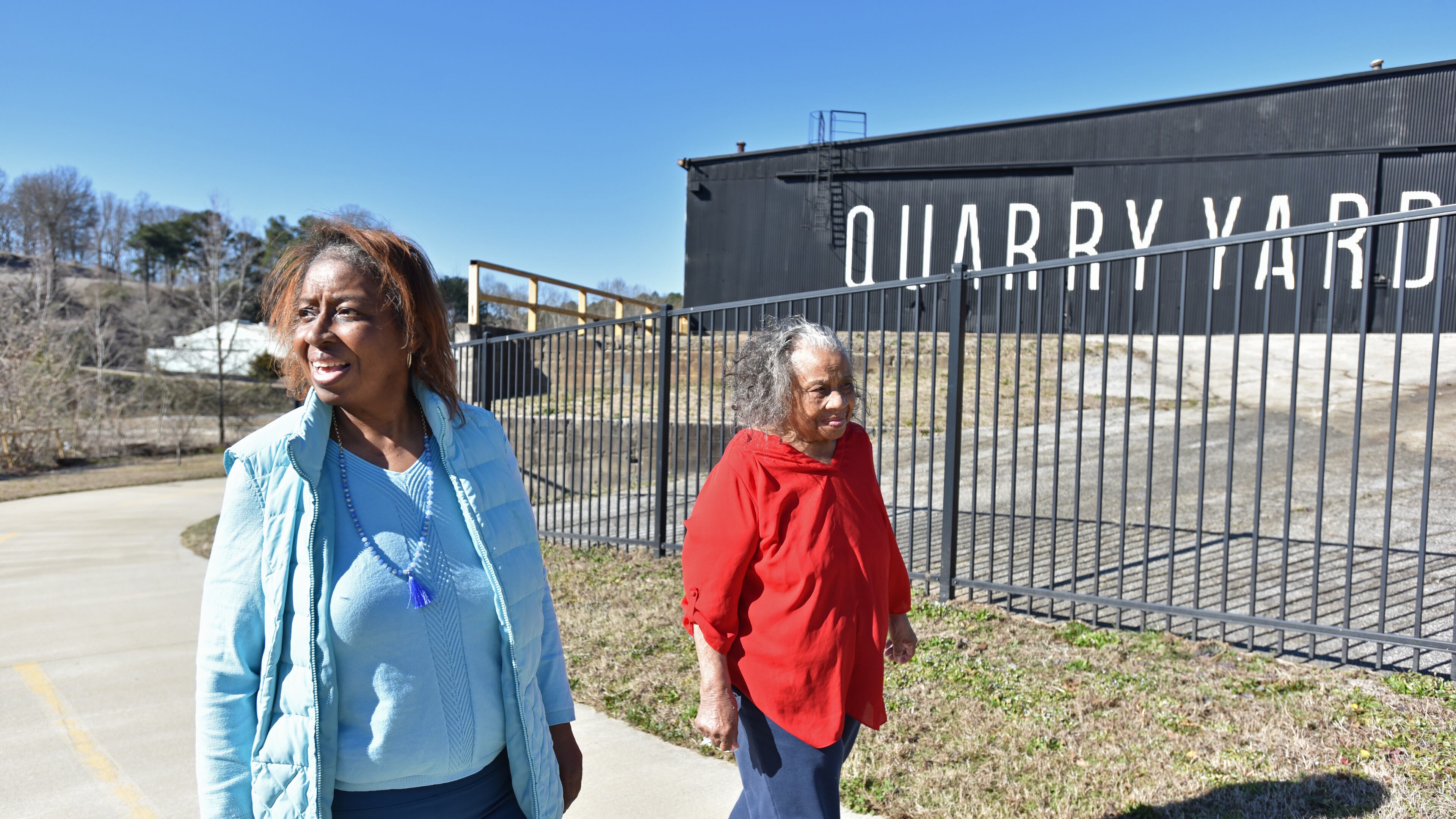 Genia Billingsley and her mother Thelma take a walk near the Quarry Yards development in Atlanta's Grove Park neighborhood. Microsoft plans to bring thousands of jobs to a new campus there. (Hyosub Shin / Hyosub.Shin@ajc.com)