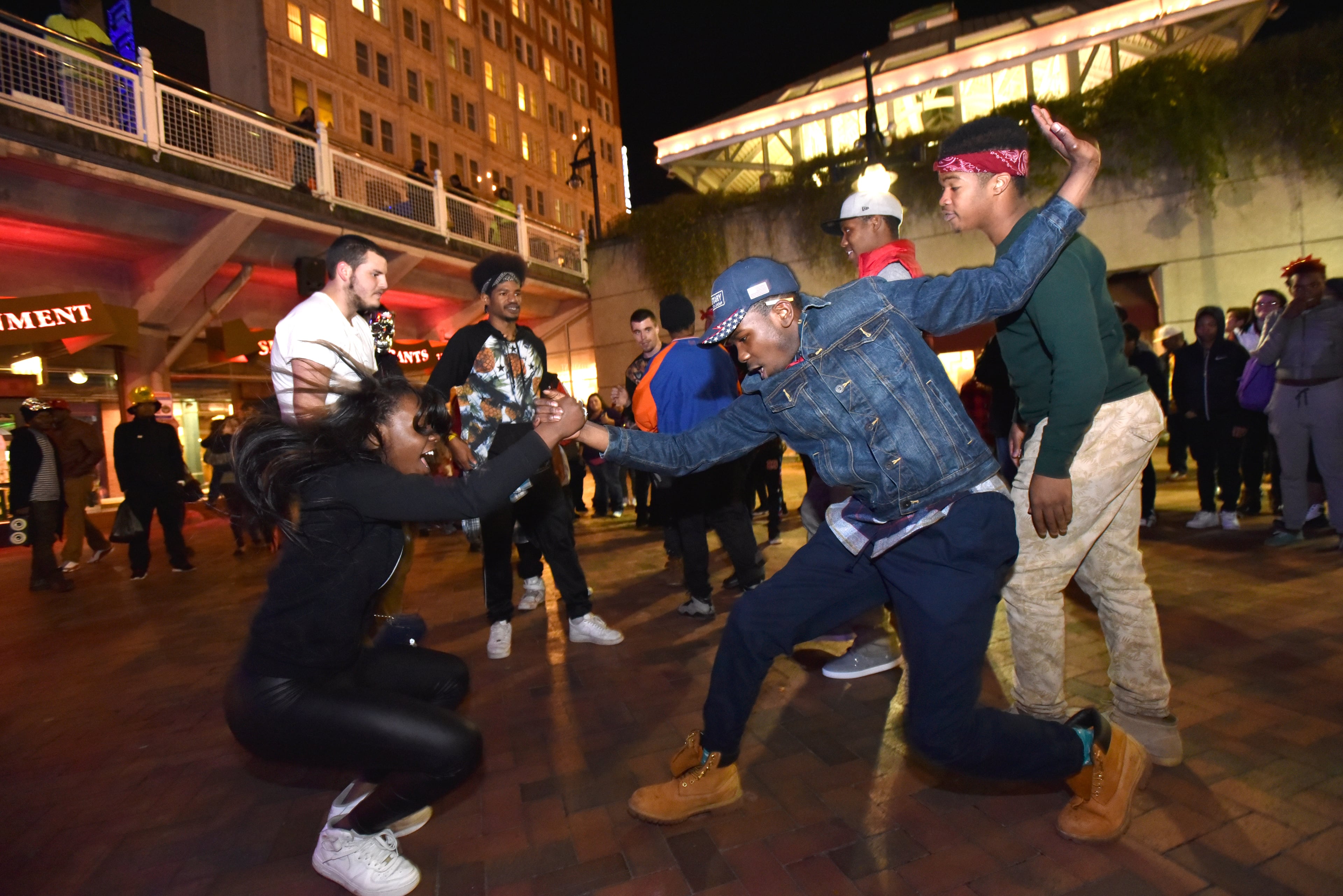 Participants dance to the live music at Underground Atlanta during Peach Drop 2016 on Thursday, December 31, 2015. Peach Drop, the largest New Year's Eve Celebration in the Southeast, continues a 27-year tradition in Downtown Atlanta. HYOSUB SHIN / HSHIN@AJC.COM