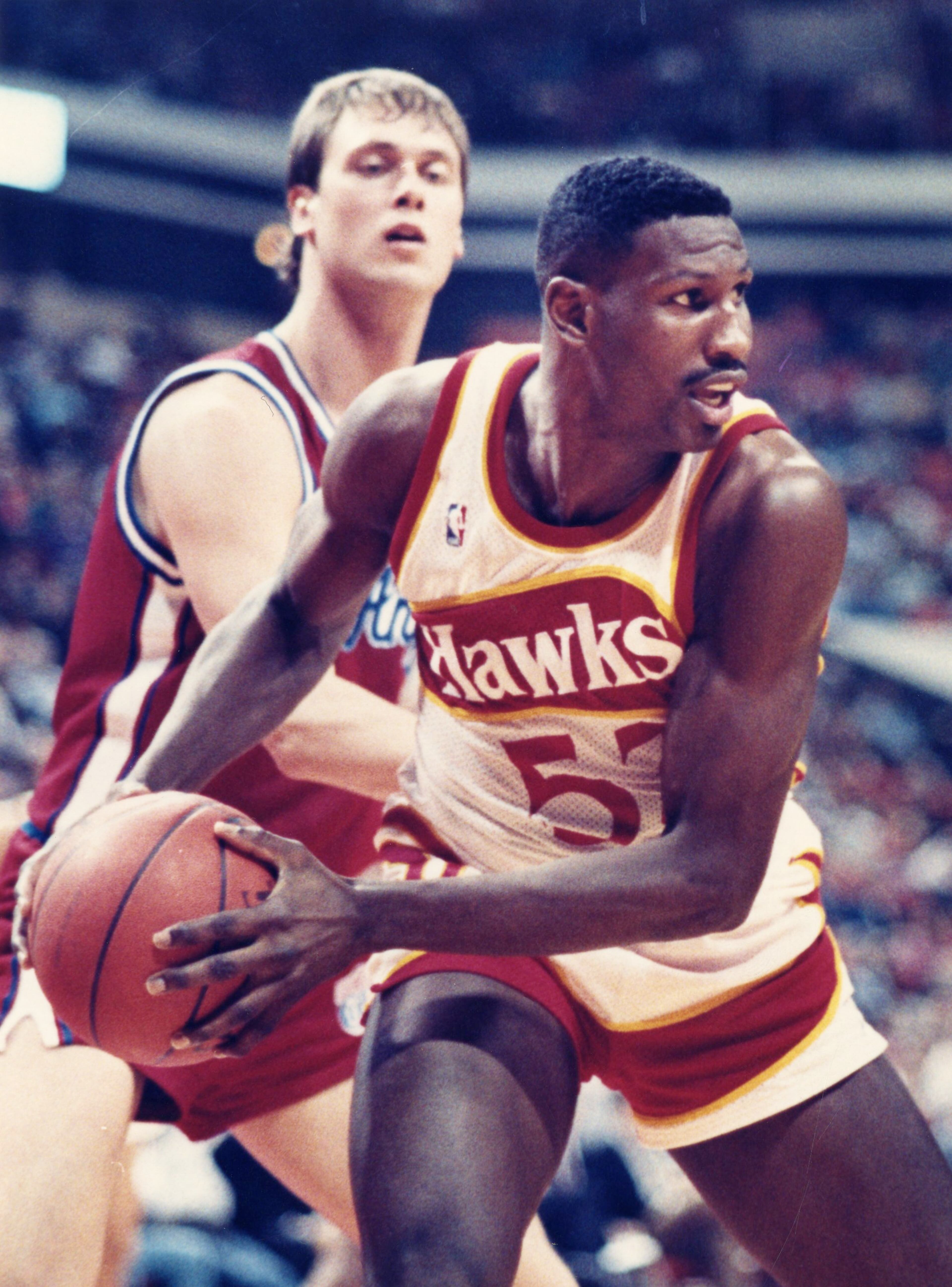 Hawks forward Cliff Levingston looks to get the ball to an open teammate. AJC file photo