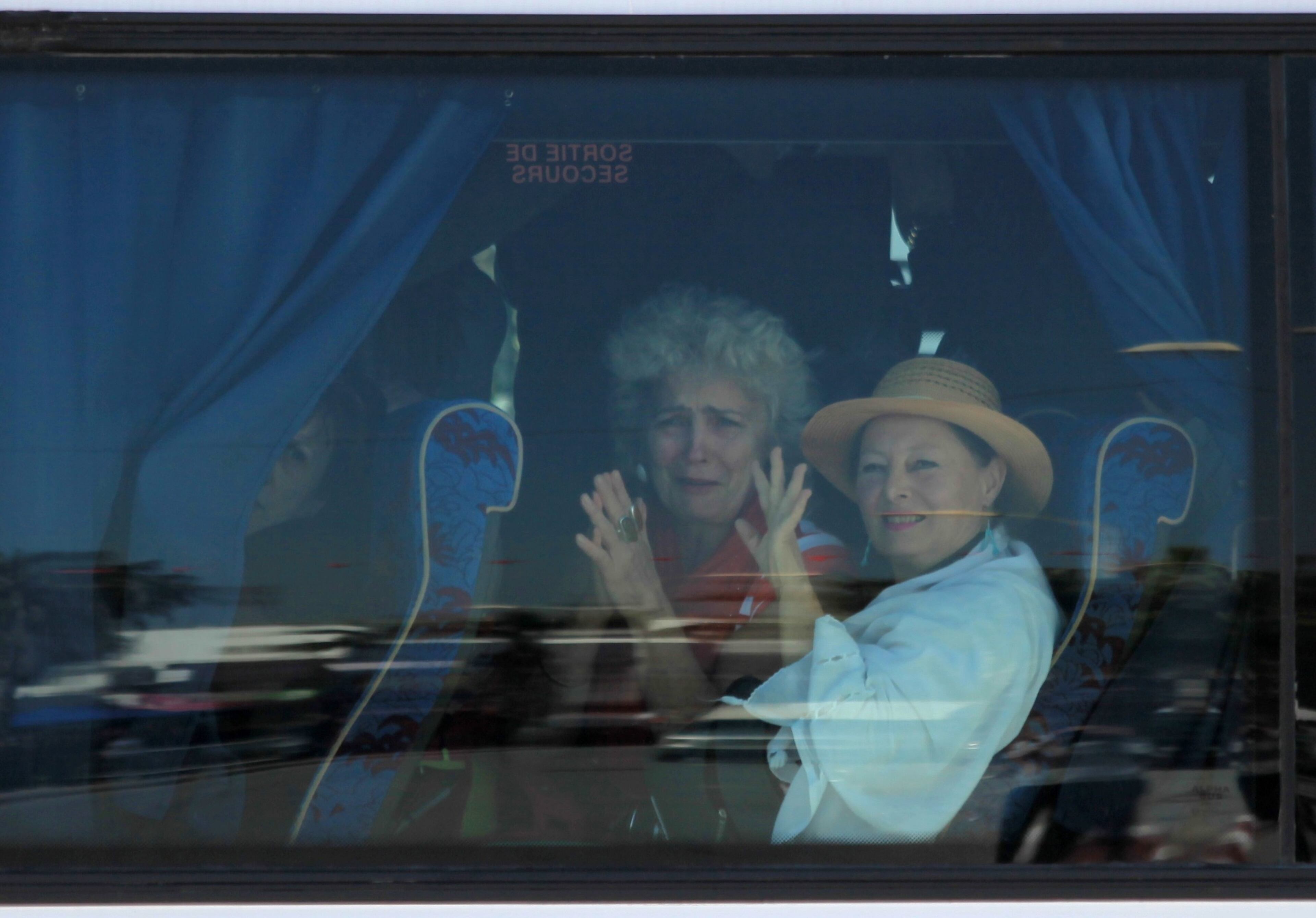 TUNIS, TUNISIA - MARCH 18 : Tunisian security forces evacuate some of the tourist after they were being held hostage during a museum attack in Tunis, Tunisia on March 18, 2015. Gunmen opened fire at the Bardo Museum in Tunisia's capital, killing 21 people including 17 tourists, the Tunisian Prime Minister said. (Yassine Gaidi - Anadolu Agency) (Photo by Yassine Gaidi/Anadolu Agency/Getty Images)